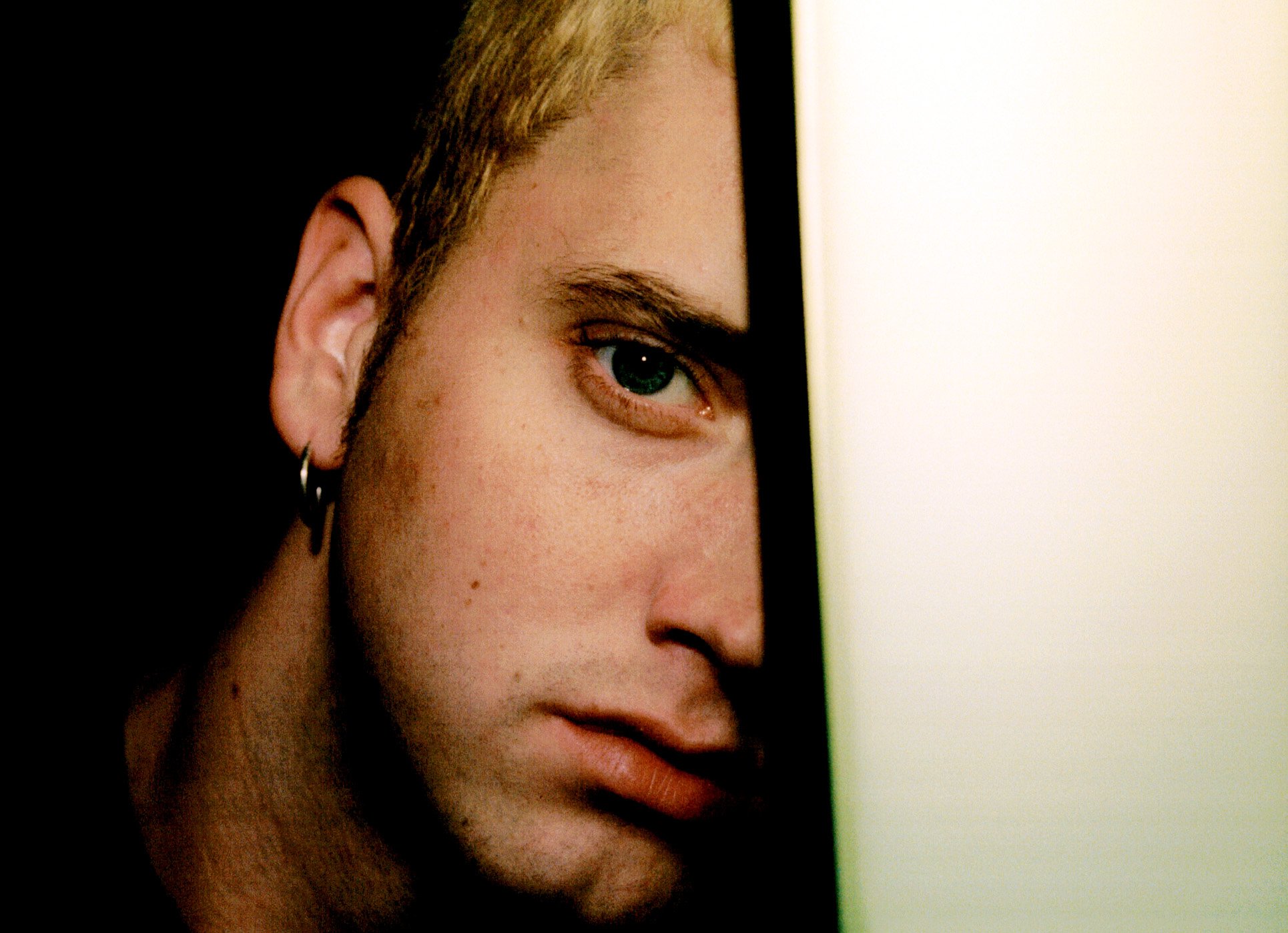 Eminem with his face partly obscured