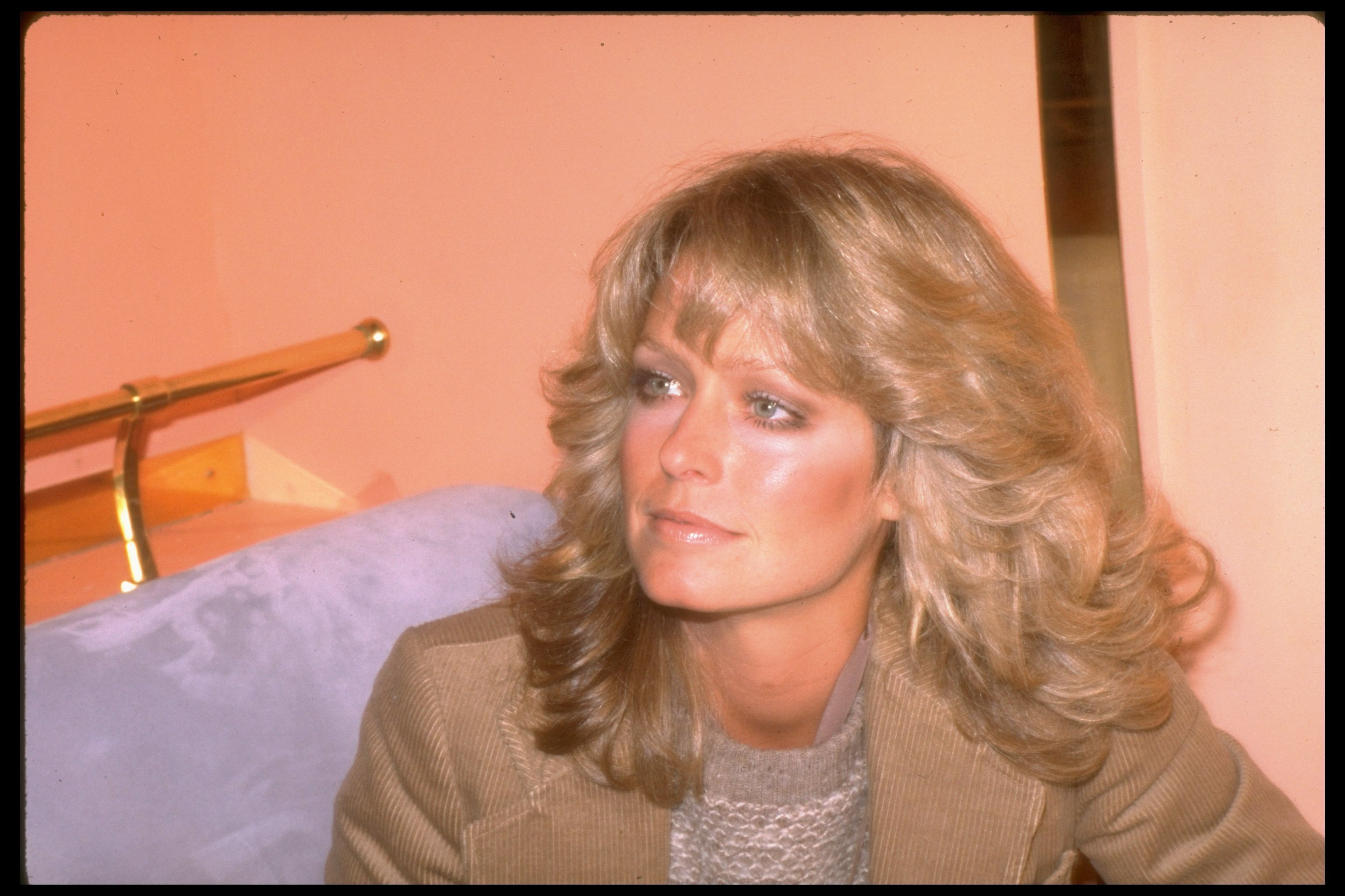 Farrah Fawcett wearing a suit