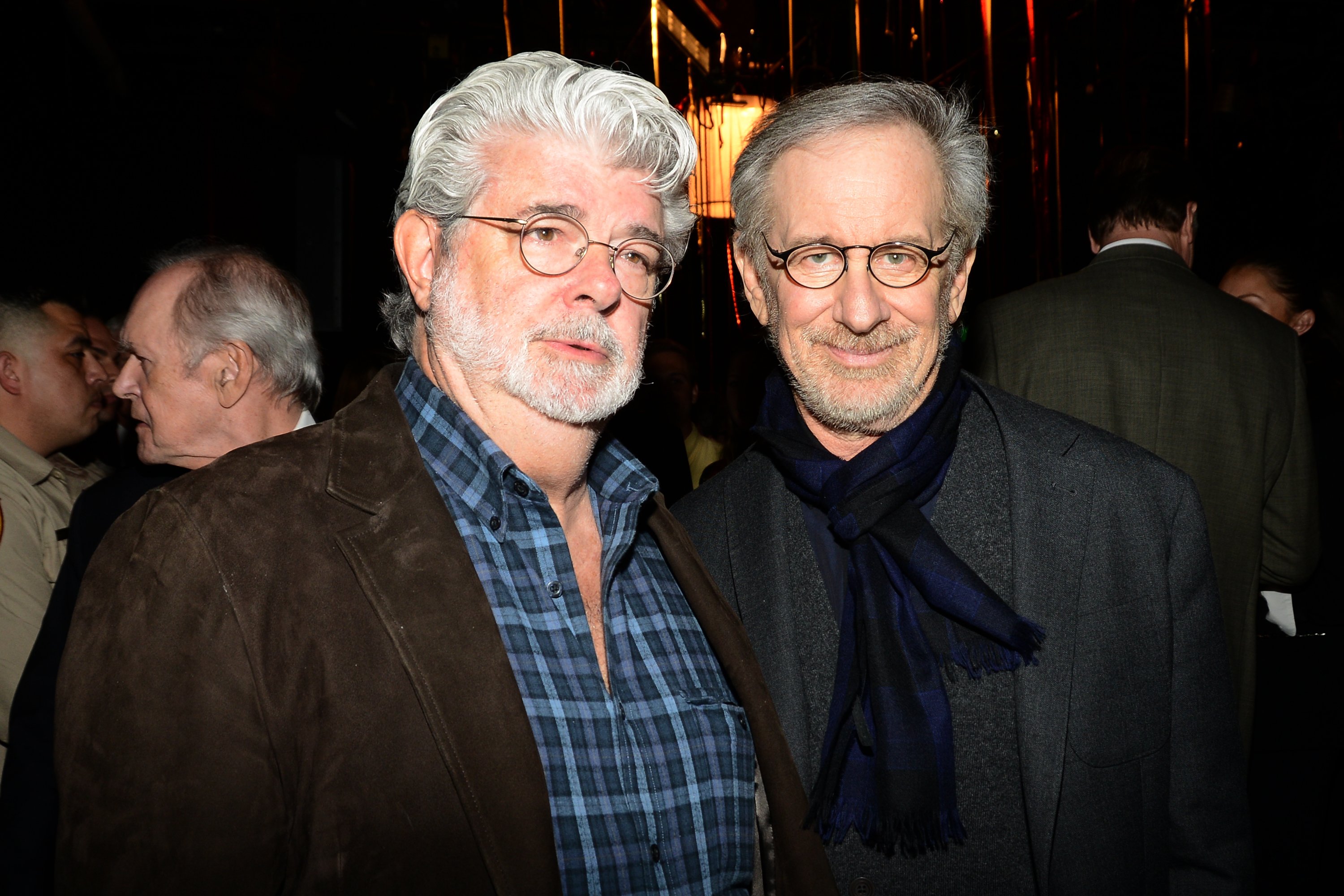 George Lucas of Star Wars fame and Steven Spielberg of Jaws fame in front of other eople