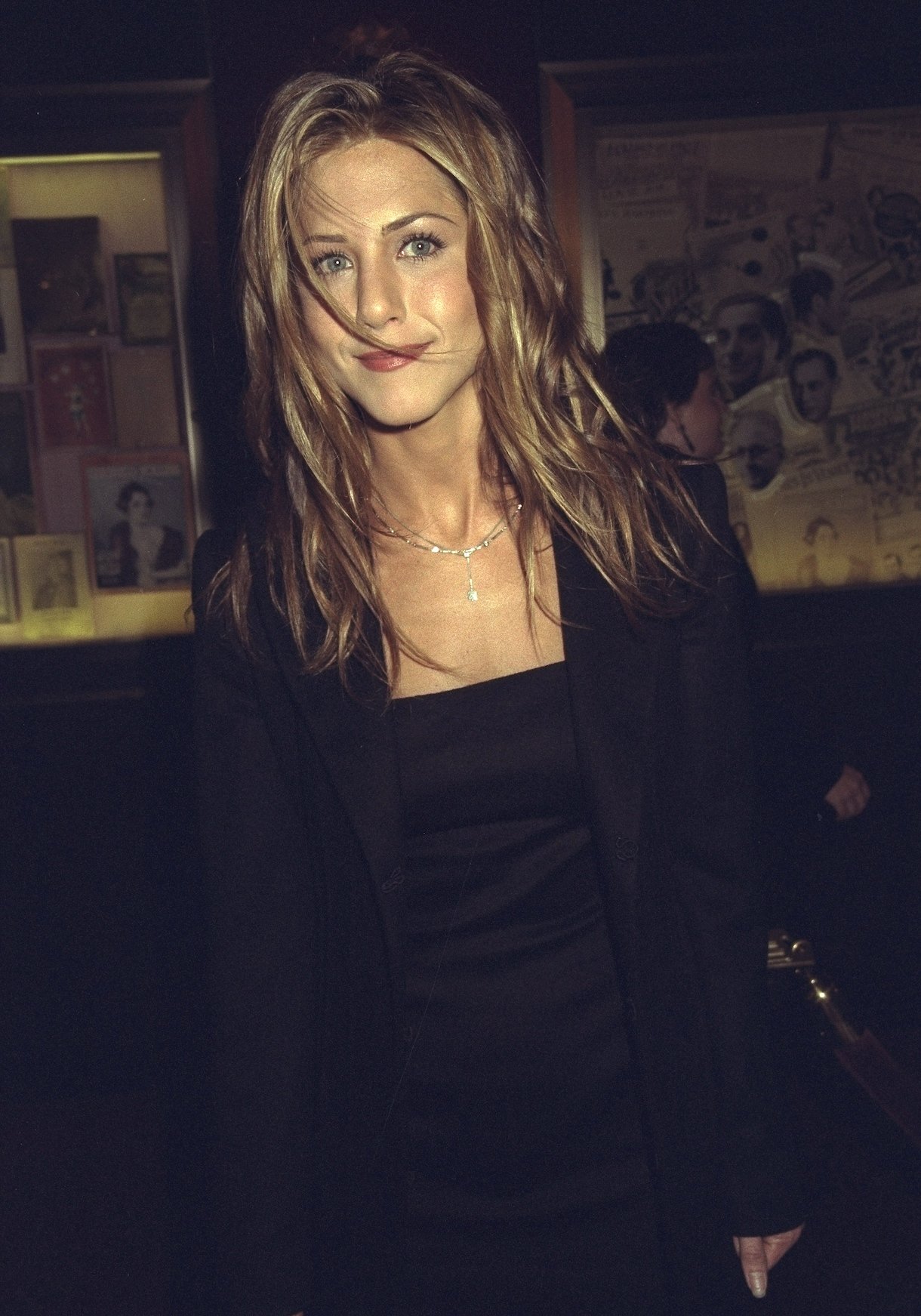 Jennifer Aniston attending movie premiere of "Meet Joe Black" at the Ziegfeld Theater