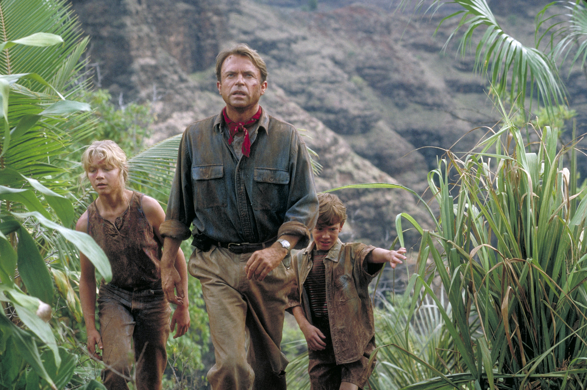 Sam Neill as Dr. Alan Grant, with Ariana Richards and Joseph Mazzello as Lex and Tim