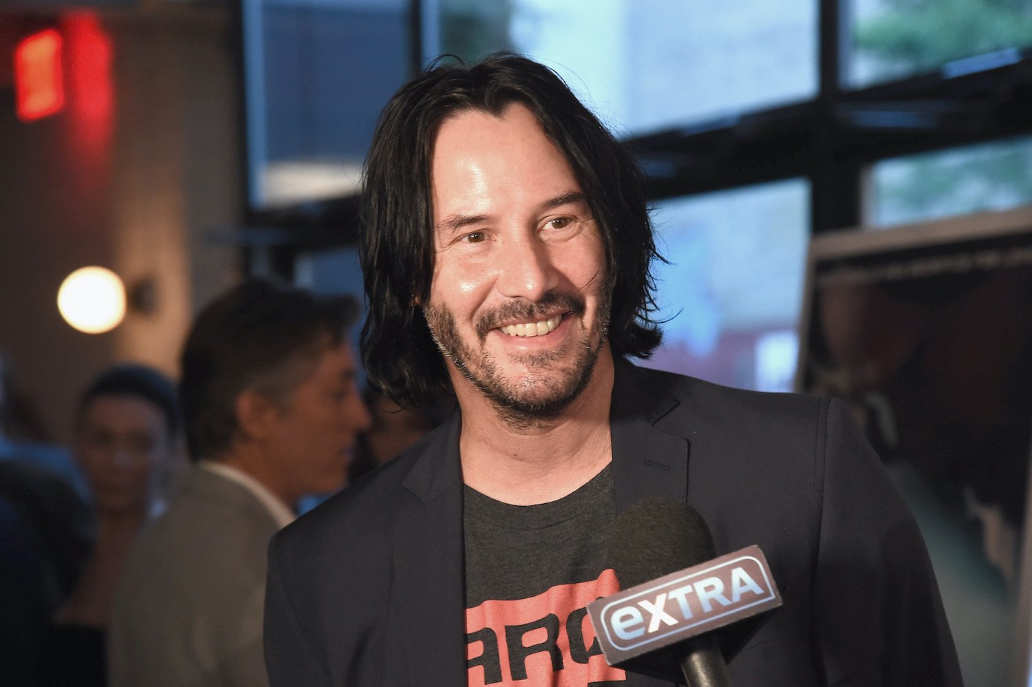Keanu Reeves smiles at the 'Siberia' New York premiere on July 11, 2018