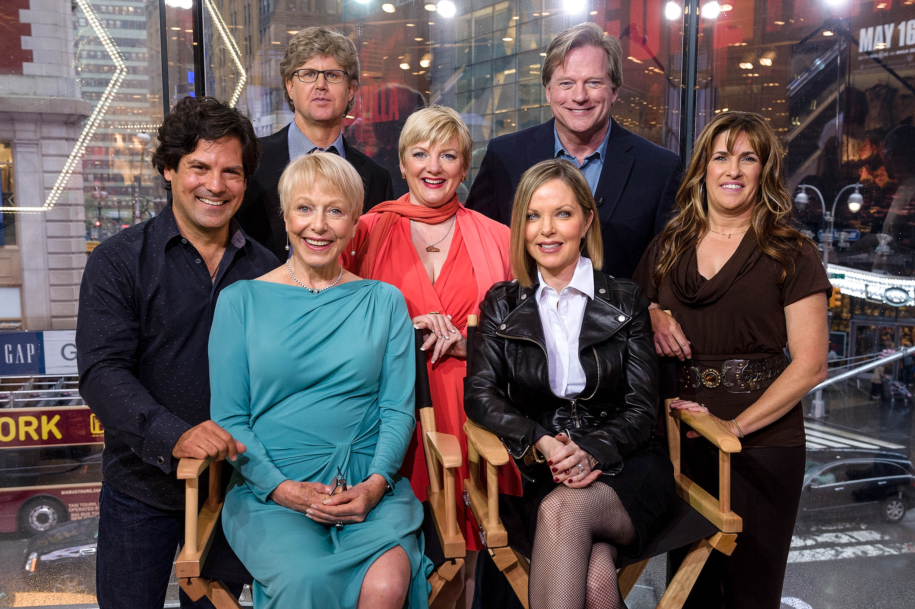 (L-R standing) Matthew Labyorteaux, Michael Landon, Jr., Alison Arngrim, Dean Butler, Lindsay Greenbush, (L-R seated) Karen Grassle, and Melissa Sue Anderson of 'Little House On The Prairie' visit 'Extra' on April 30, 2014. 