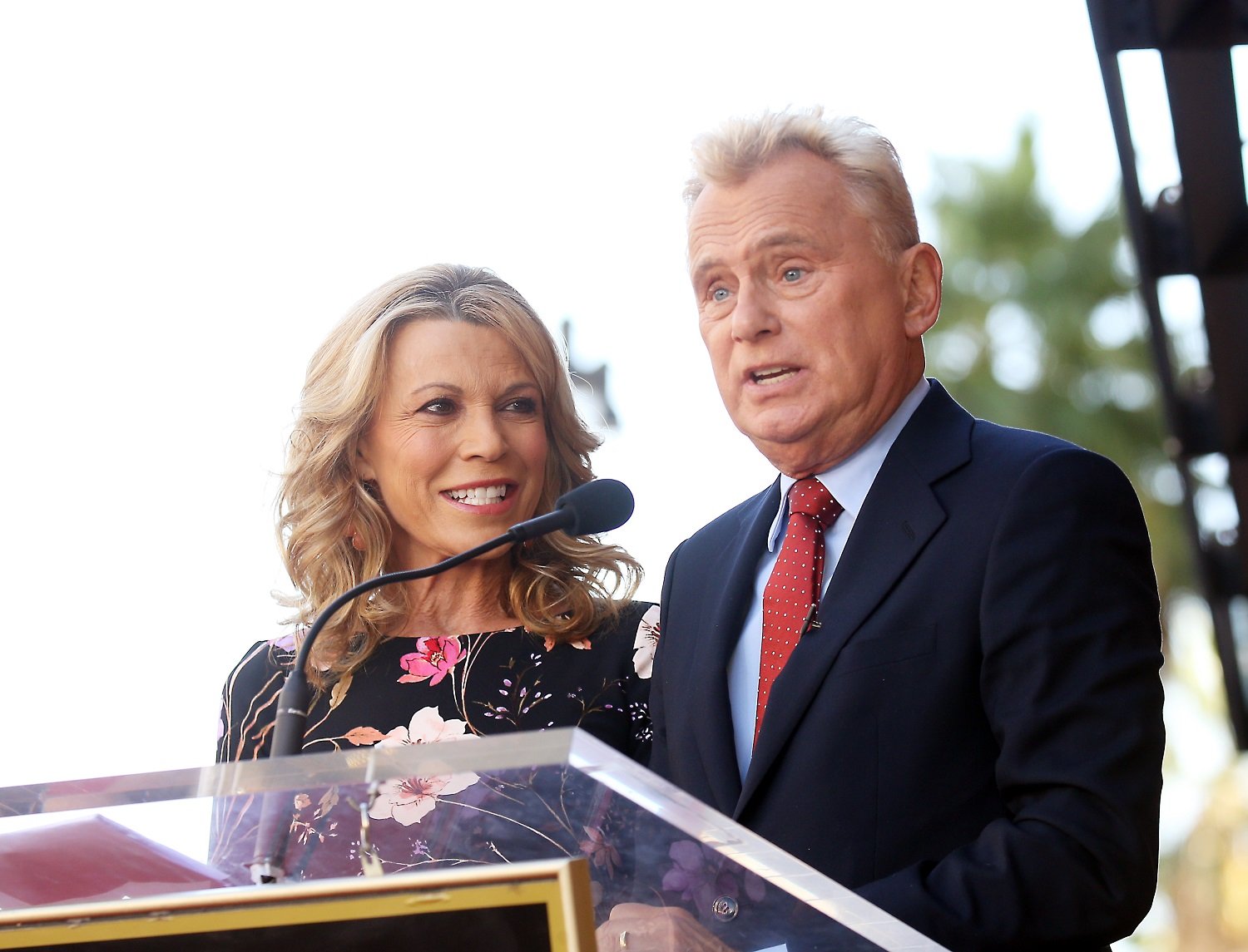 Vanna White and Pat Sajak of Wheel of Fortune 
