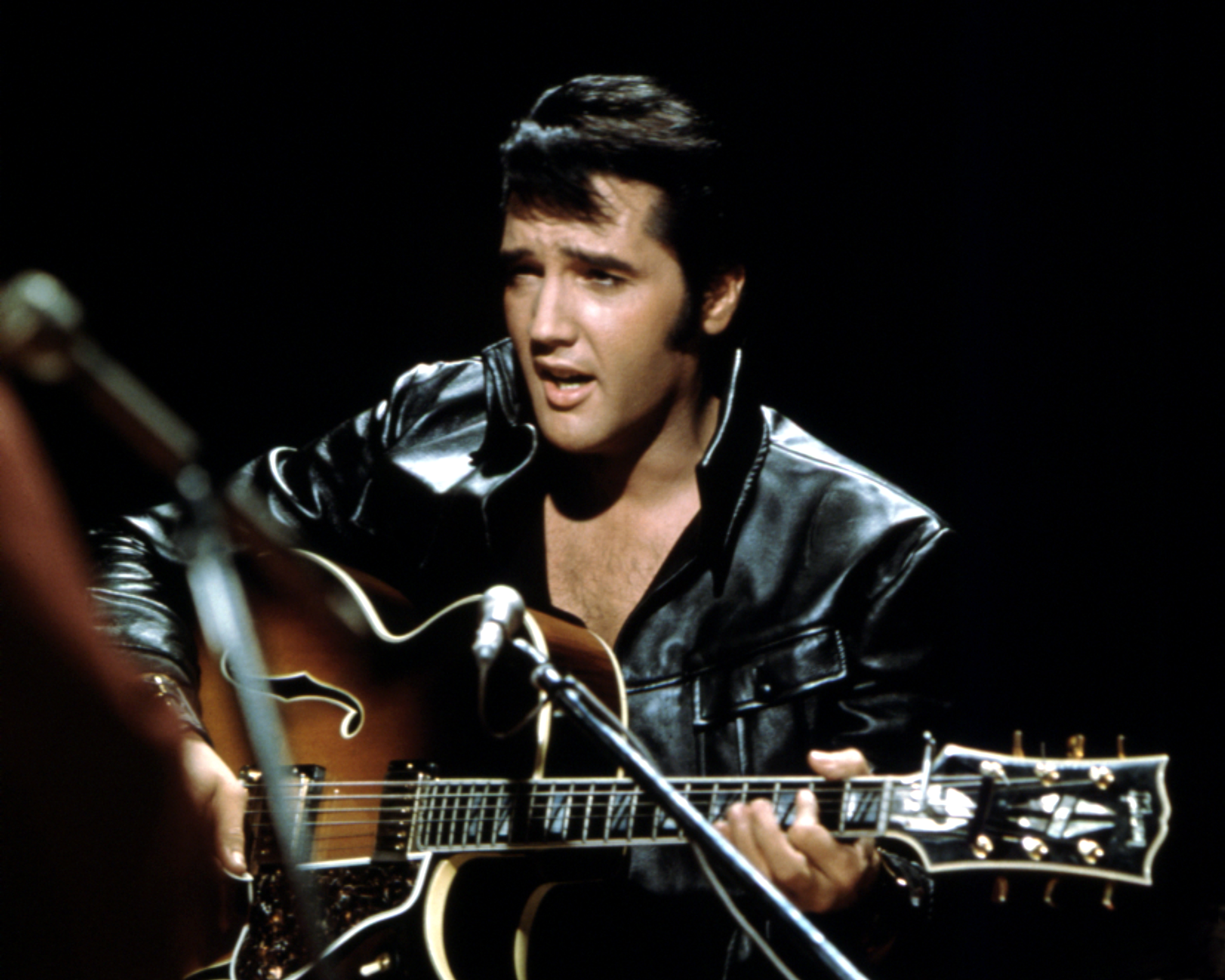 Elvis Presley with a guitar