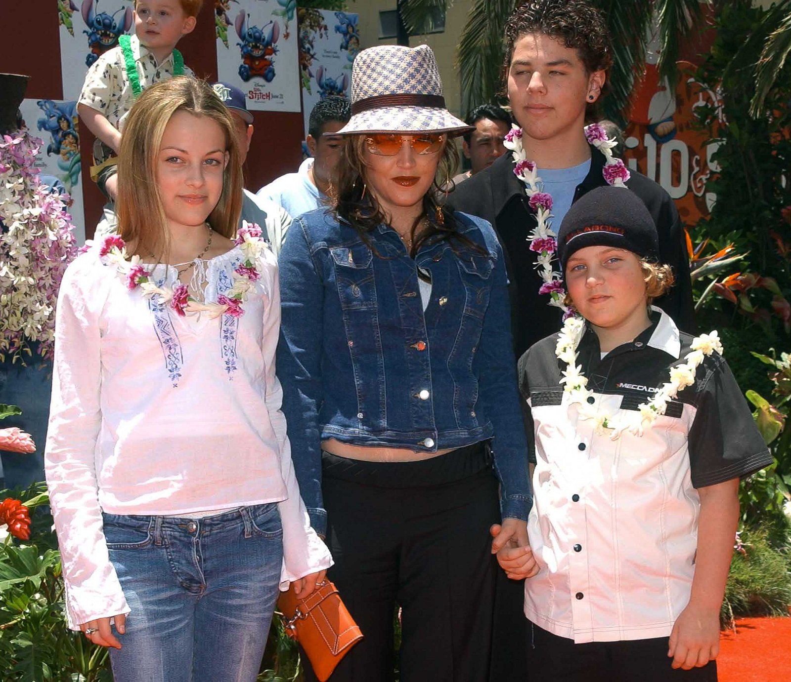 Lisa Marie Presley and her children Benjamin Keough (R), Riley Keough (L), and her half-brother Navarone Garibaldi 
