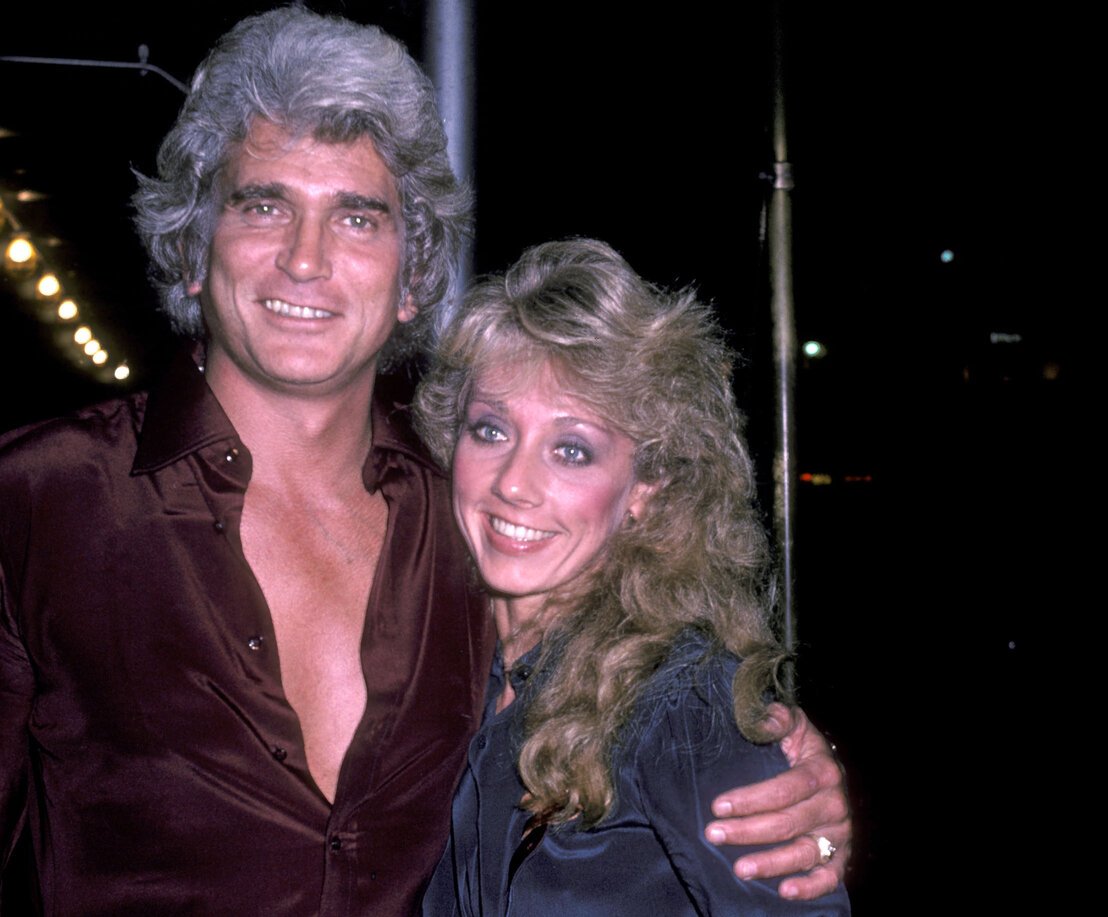 Michael Landon and girlfriend Cindy Clerico on November 21, 1982 pose for photographs outside the Sherry Netherlands Hotel in New York City