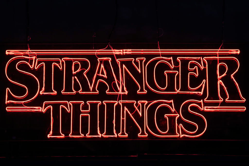 A Stranger Things logo with a black background