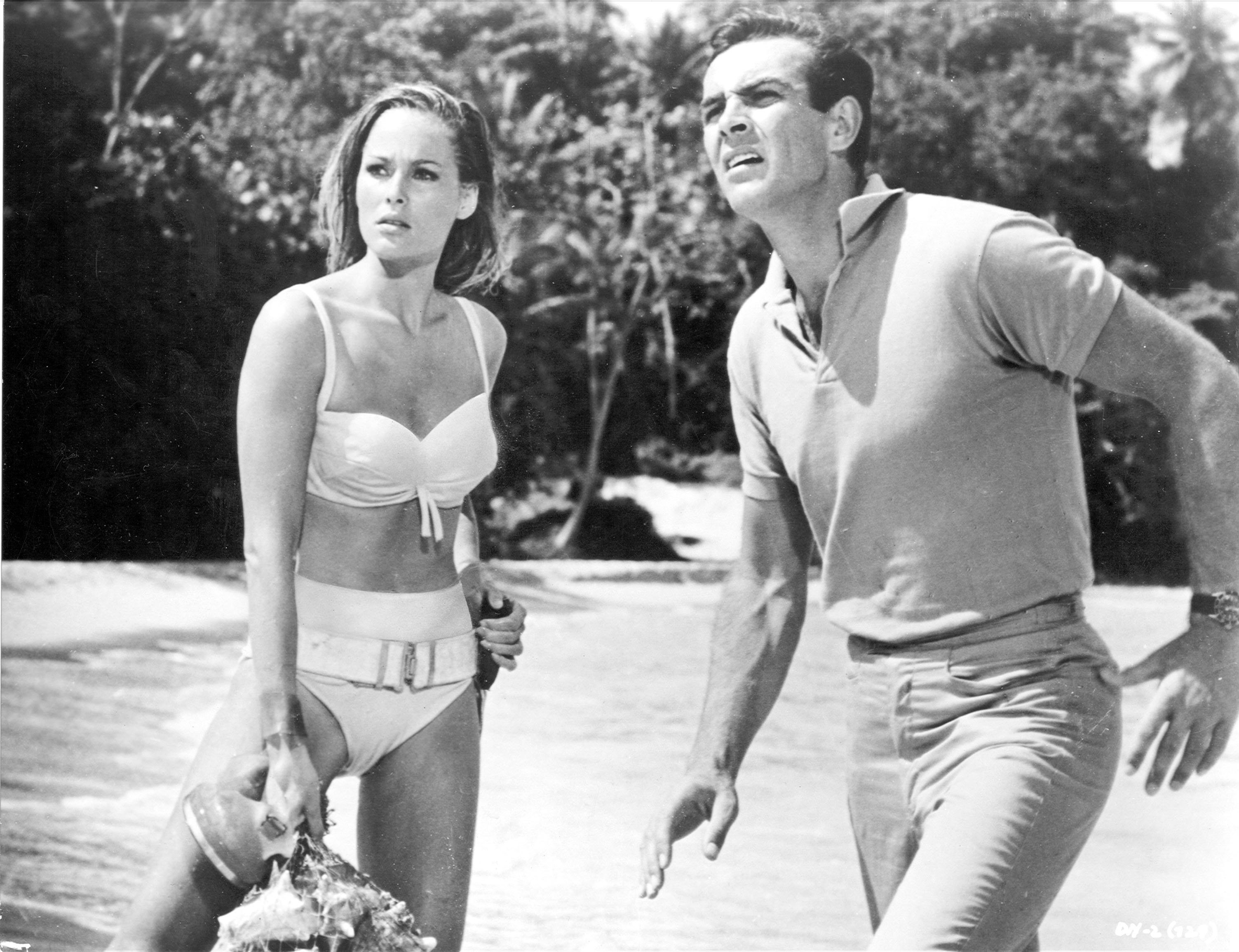 Ursula Andress and Sean Connery on a beach