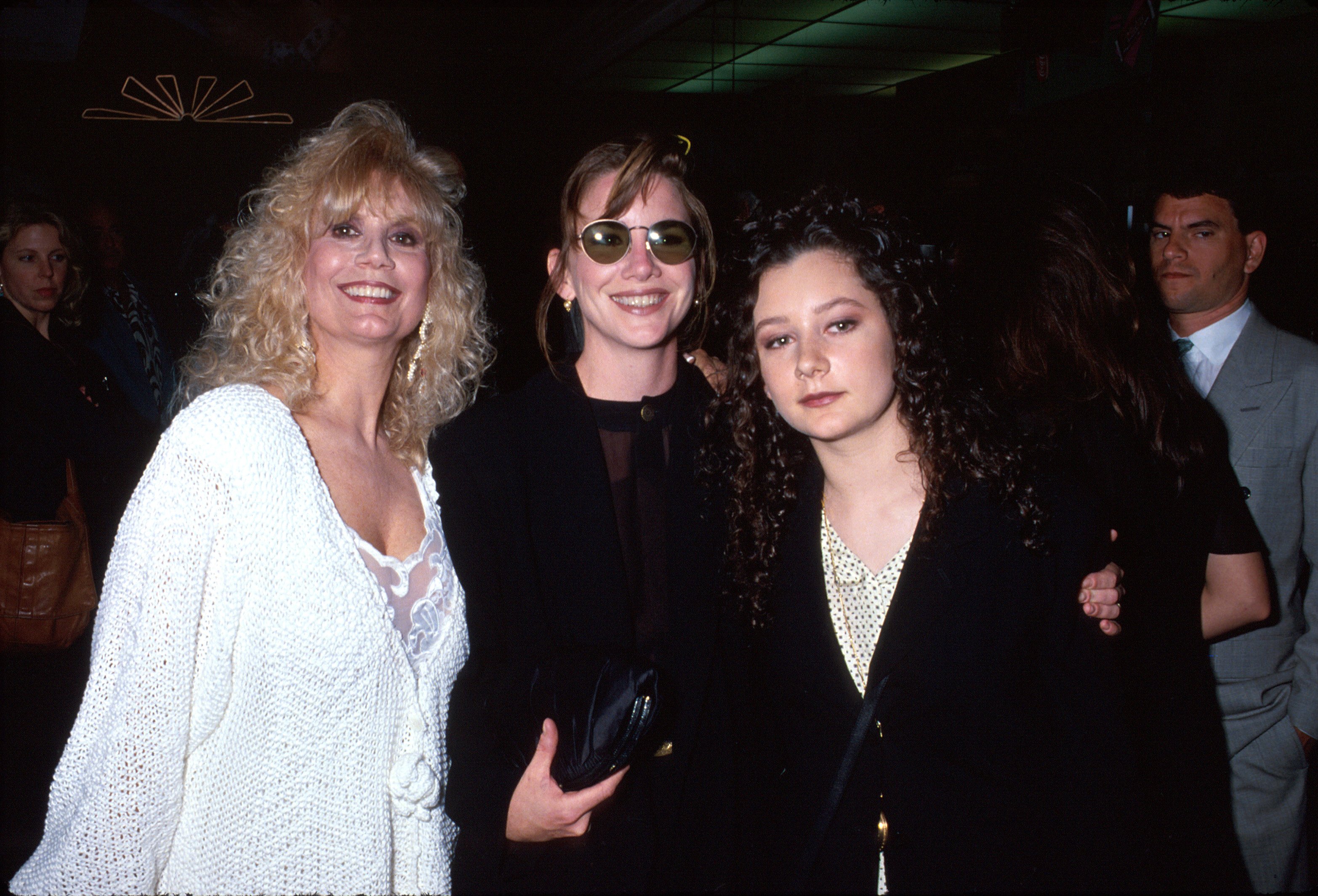 Actress sisters Melissa Gilbert (C) and Sara Gilbert (R) w. their mother.