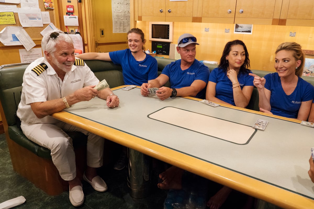 Captain Lee Rosbach, Adrian Martin, Ashton Pienaar, Laura Betancourt, Kate Chastain from 'Below Deck' getting a tip