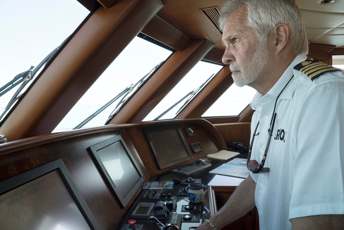 Captain Lee Rosbach at the helm.