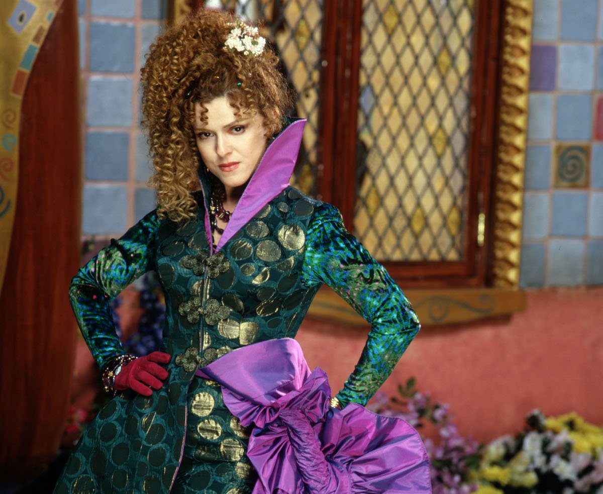 Bernadette Peters in a green and purple gown as the Evil Stepmother in 'Rodgers and Hammerstein's Cinderella' on ABC, 1997 | Disney
