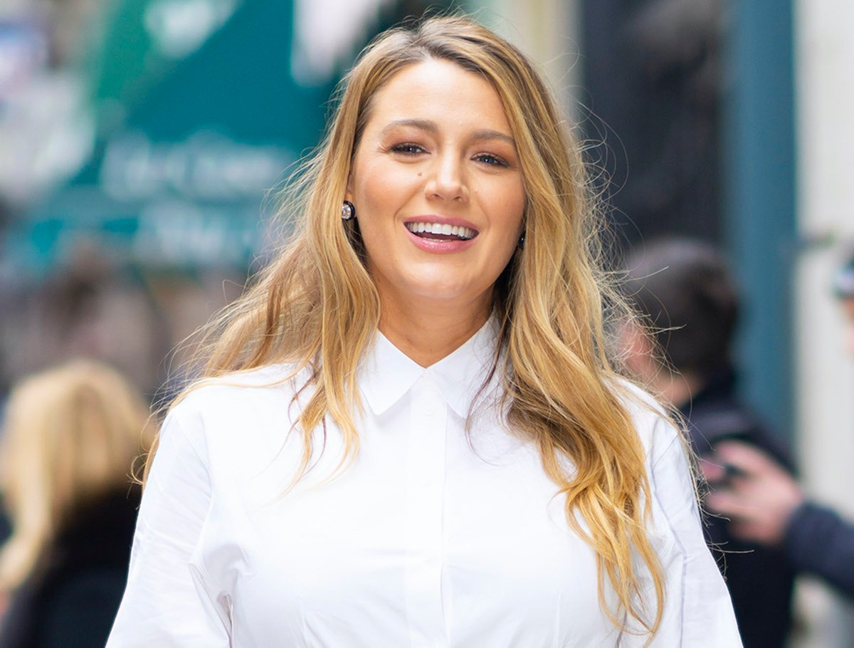 Blake Lively wearing a white button-down shirt and black skirt on January 28, 2020 on the streets of New York City | Jackson Lee/GC Images