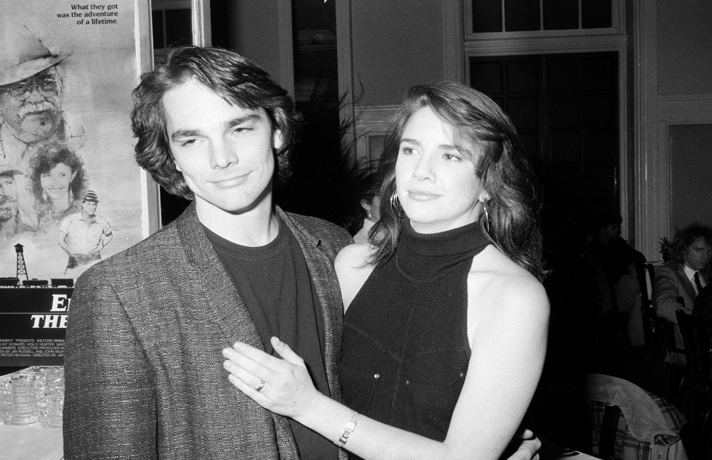 Melissa Gilbert and her first husband, Bo Brinkman, in black and white. His arm is around her and her hand is on his chest.