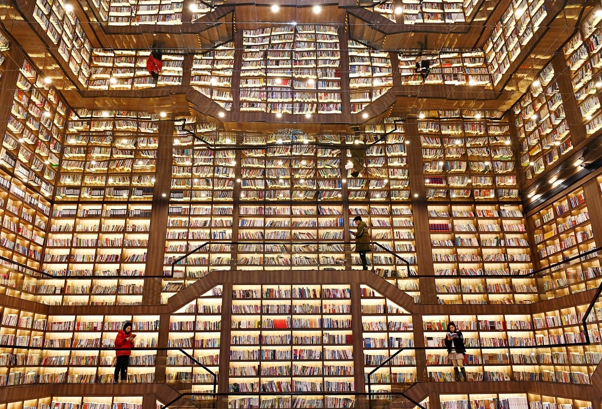People read books inside the Songpo bookstore during the Spring Festival holiday on February 16, 2021 in Shaoyang, Hunan Province of China.