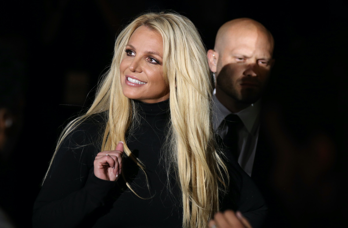 Britney spears looking sideways wearing black