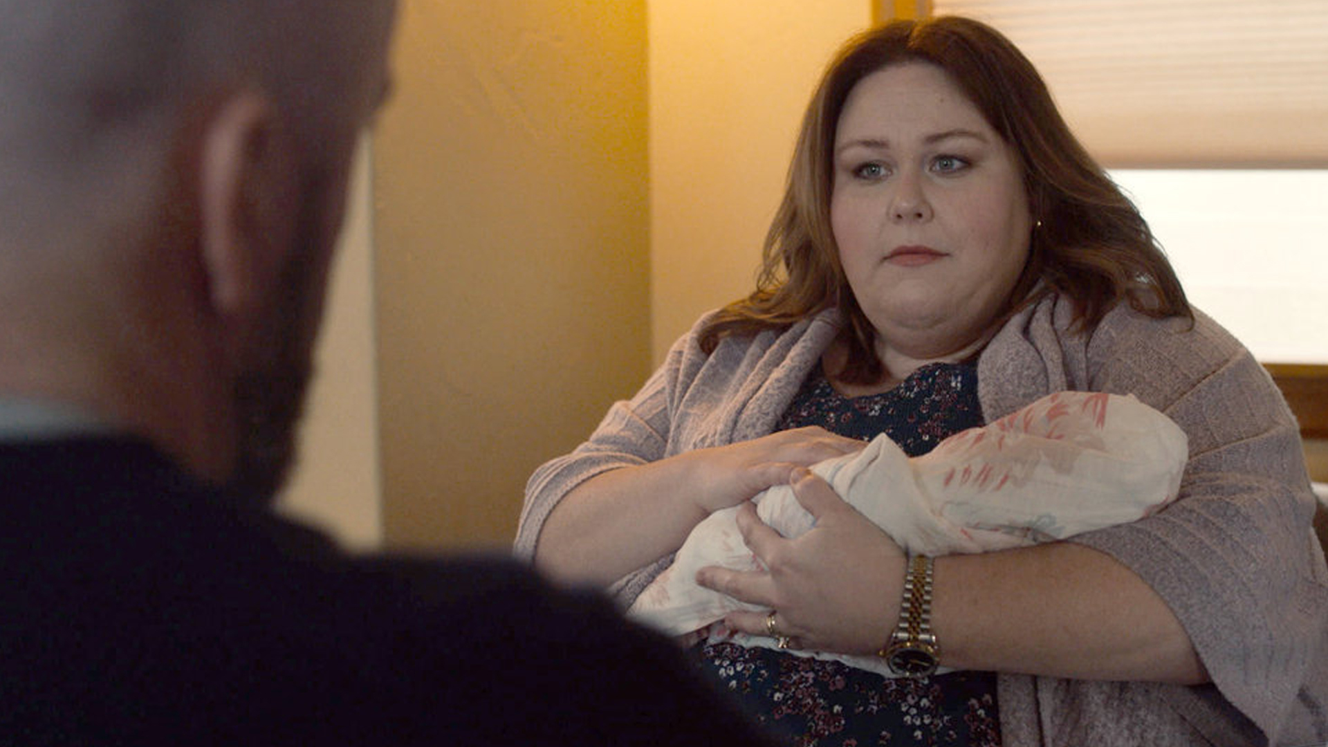 Chris Sullivan as Toby and Chrissy Metz as Kate holding baby Hailey Rose Damon in ‘This Is Us’ Season 5 Episode 9, “The Ride.”