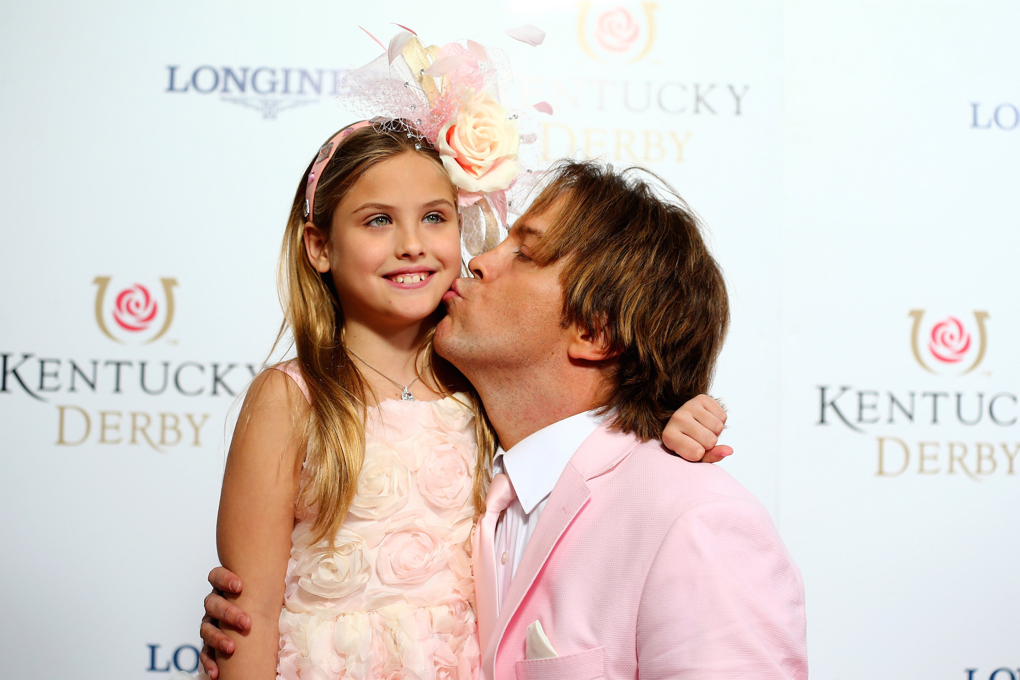 Dannielynn Birkhead (L) and Larry Birkhead attend the 141st Kentucky Derby