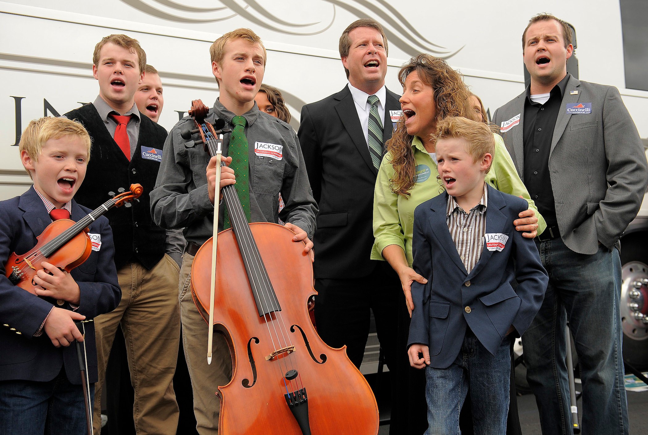 The Duggar family singing together