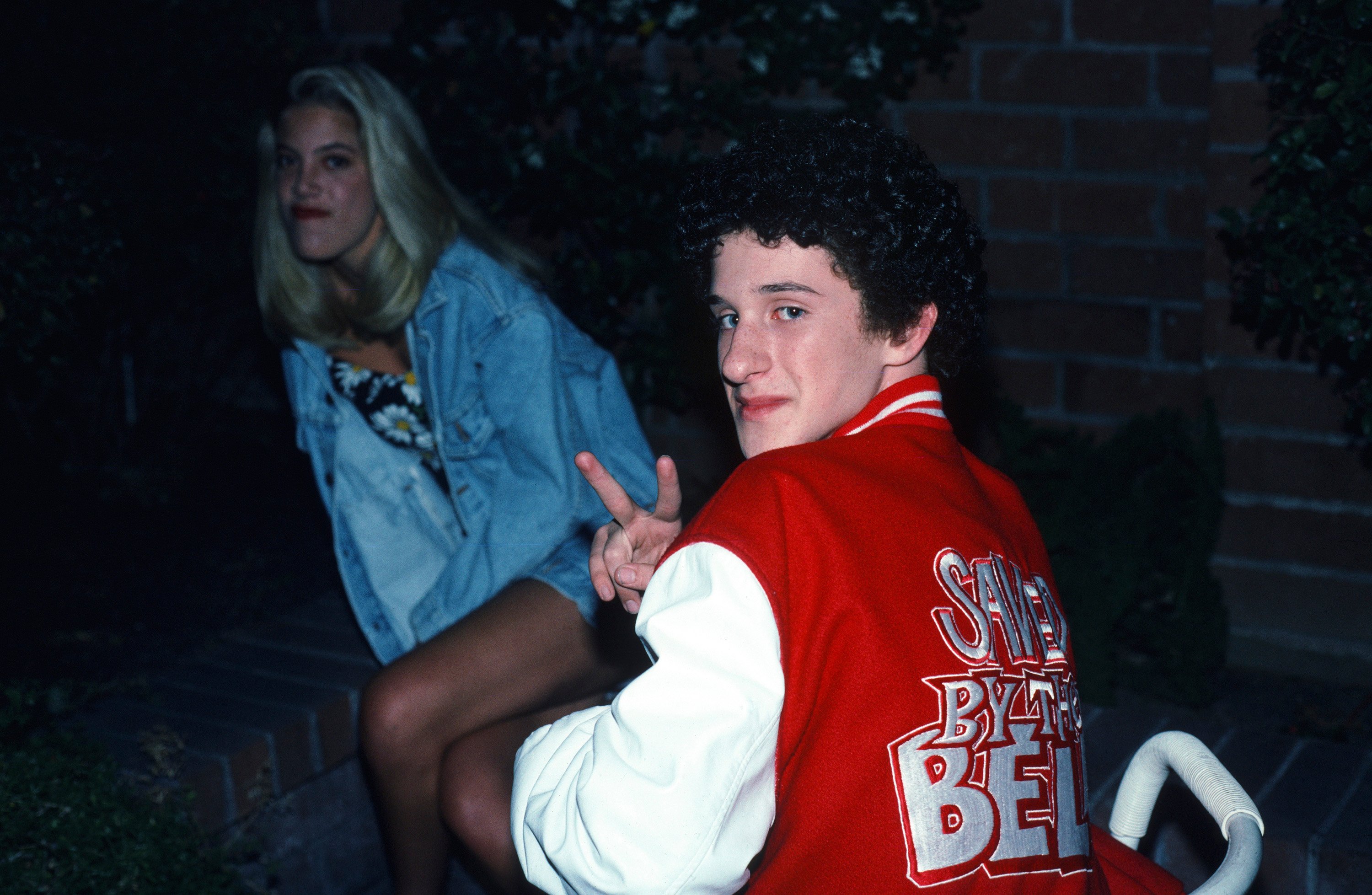 Dustin Diamond and Tori Spelling | Alice S. Hall/NBCU Photo Bank/NBCUniversal via Getty Images 