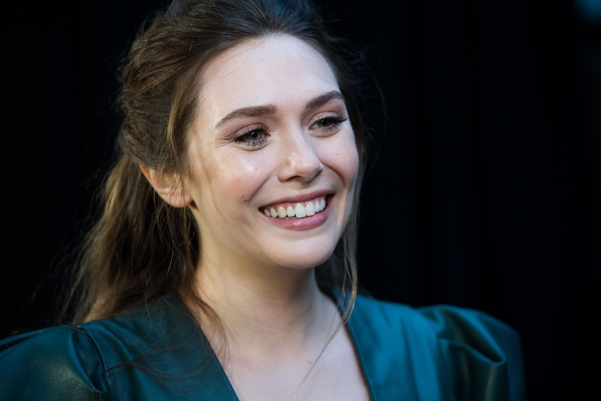 Elizabeth Olsen smiles at the UK Fan Event for 'Avengers: Infinity War'