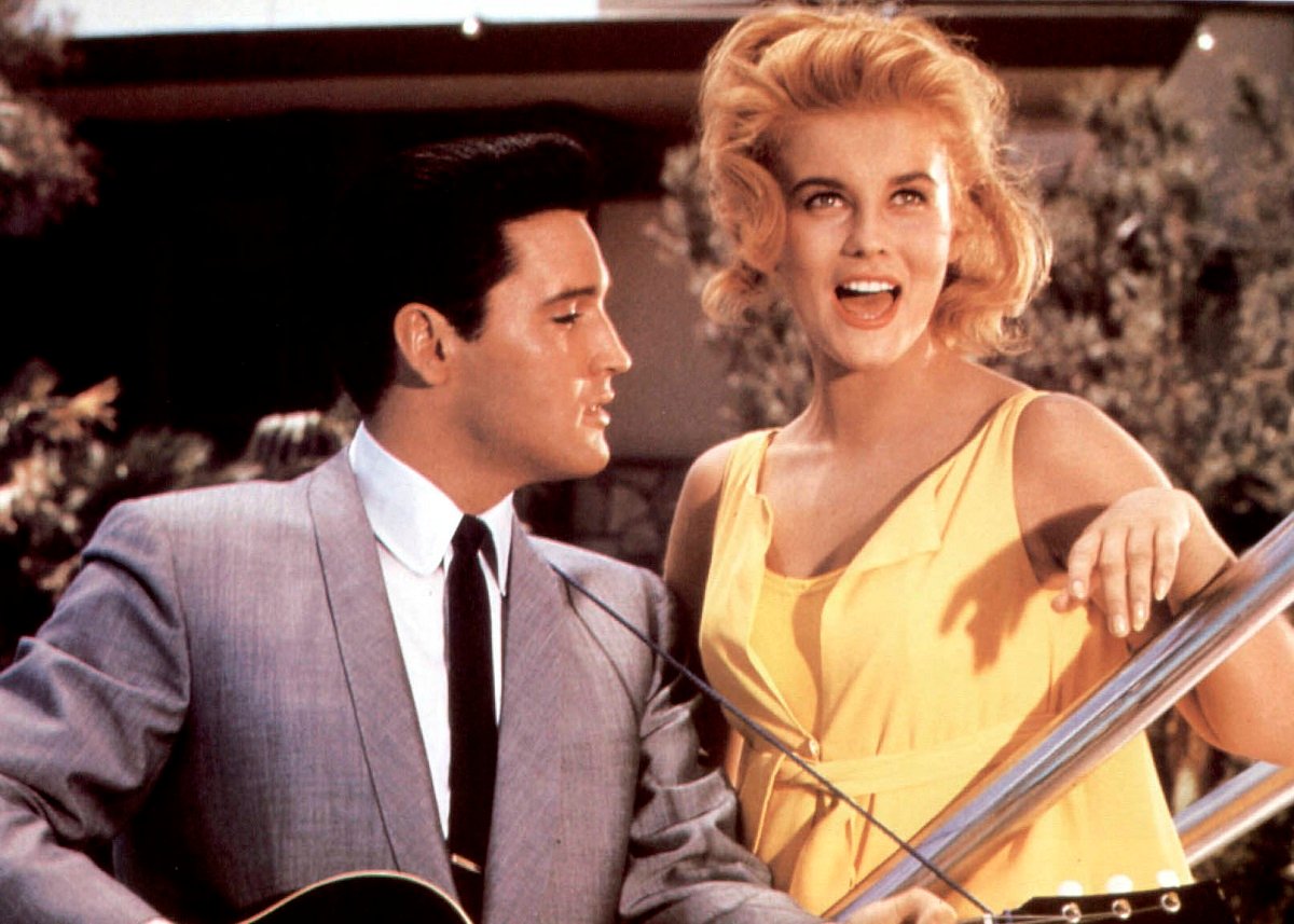 Elvis Presley and Ann-Margret singing together in a color still from the movie 'Viva Las Vegas' in 1964