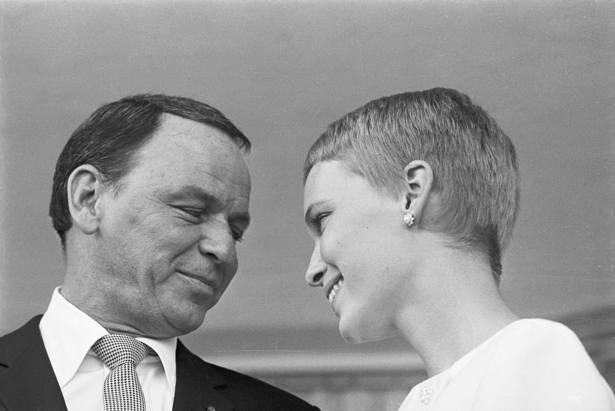 Frank Sinatra and Mia Farrow exchange fond glances following their wedding on July 19, 1966, at the Sands Hotel in Las Vegas | Bettmann via Getty Images