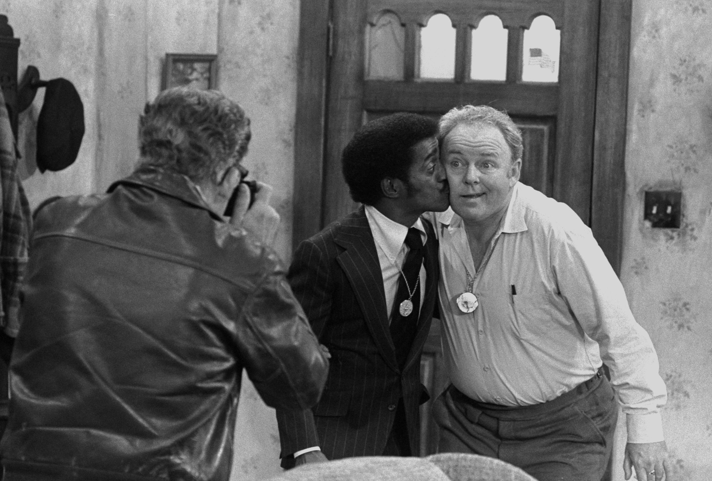 'All in the Family' episode 'Sammy's Visit' featuring (at right) Carroll O'Connor as Archie Bunker and (left) entertainer Sammy Davis Jr. (as himself), 1972