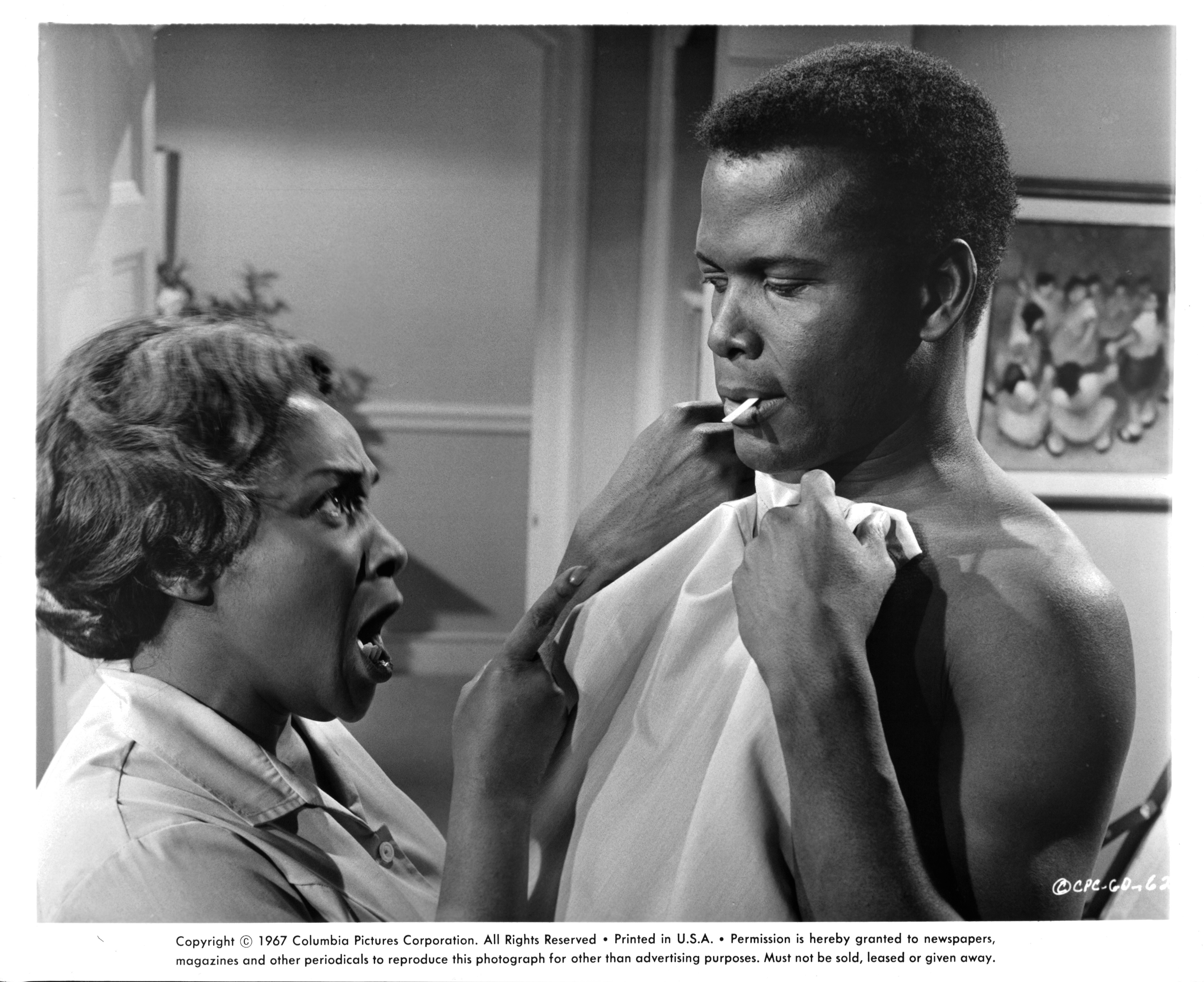 Actors Isabel Sanford and Sidney Poitier in a scene from the 1967 film 'Guess Who's Coming to Dinner'