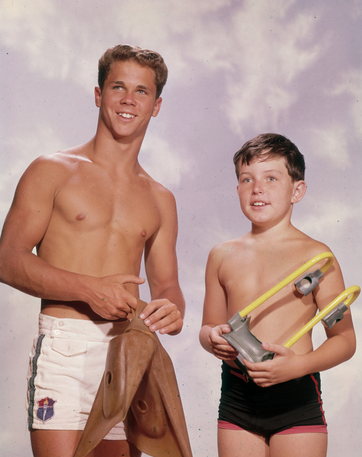 Tony Dow as Wally Cleaver and Jerry Mathers as Beaver Cleaver dressed in swimming trunks on 'Leave It to Beaver,' 1955
