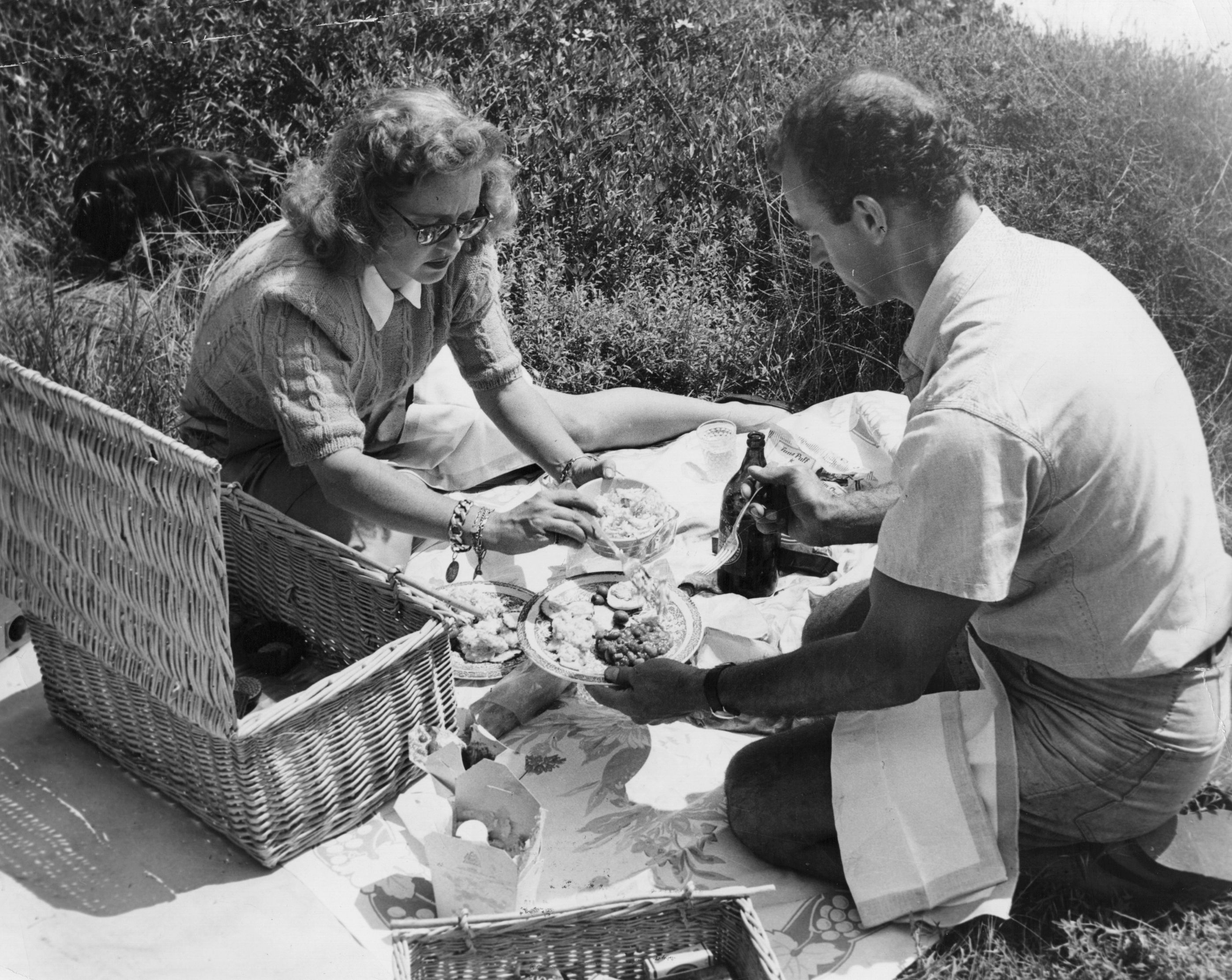 Bette Davis in 1947 enjoying a picnic with husband William Grant Sherry