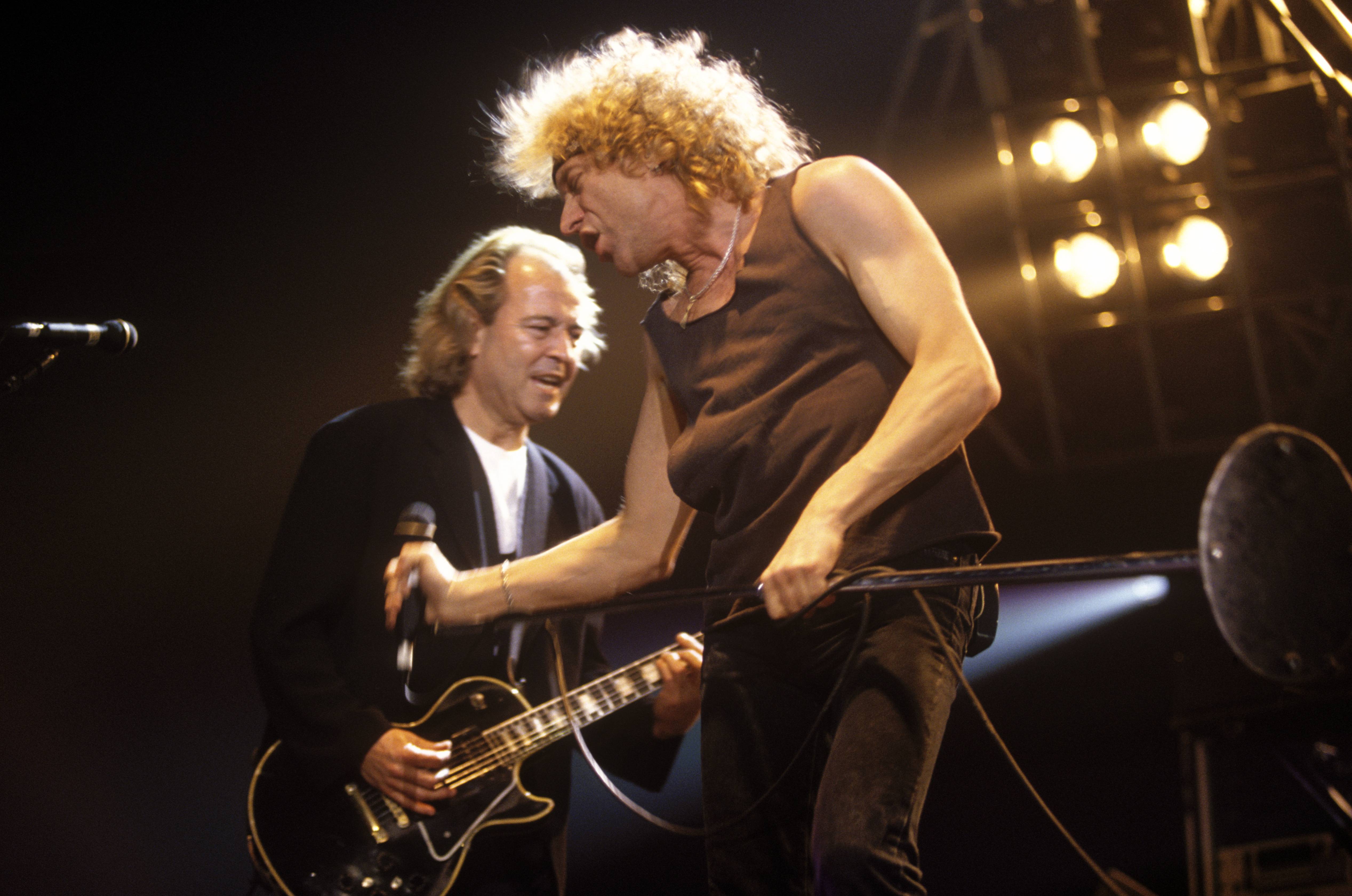 (L to R): Guitarist Mick Jones and singer Lou Gramm of Foreigner