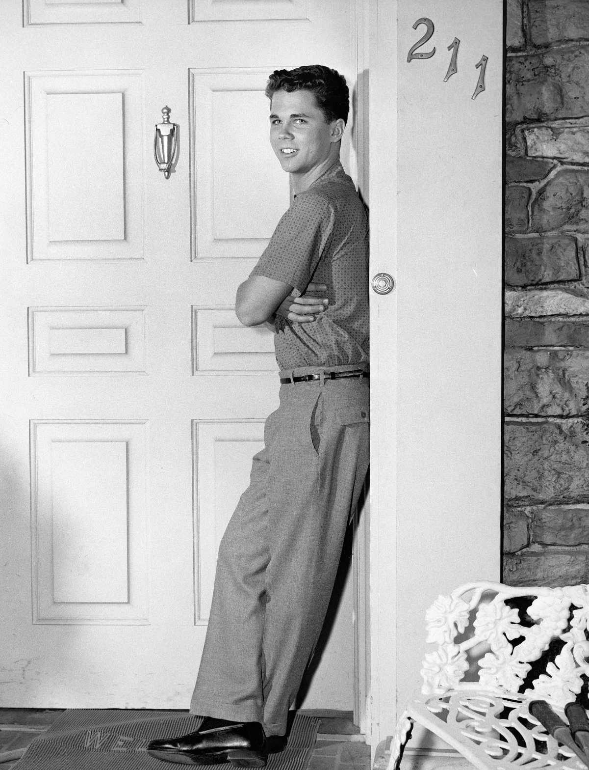 'Leave It to Beaver's actor Tony Dow who portrayed Wally Beaver, in front of the Cleaver home, circa 1960