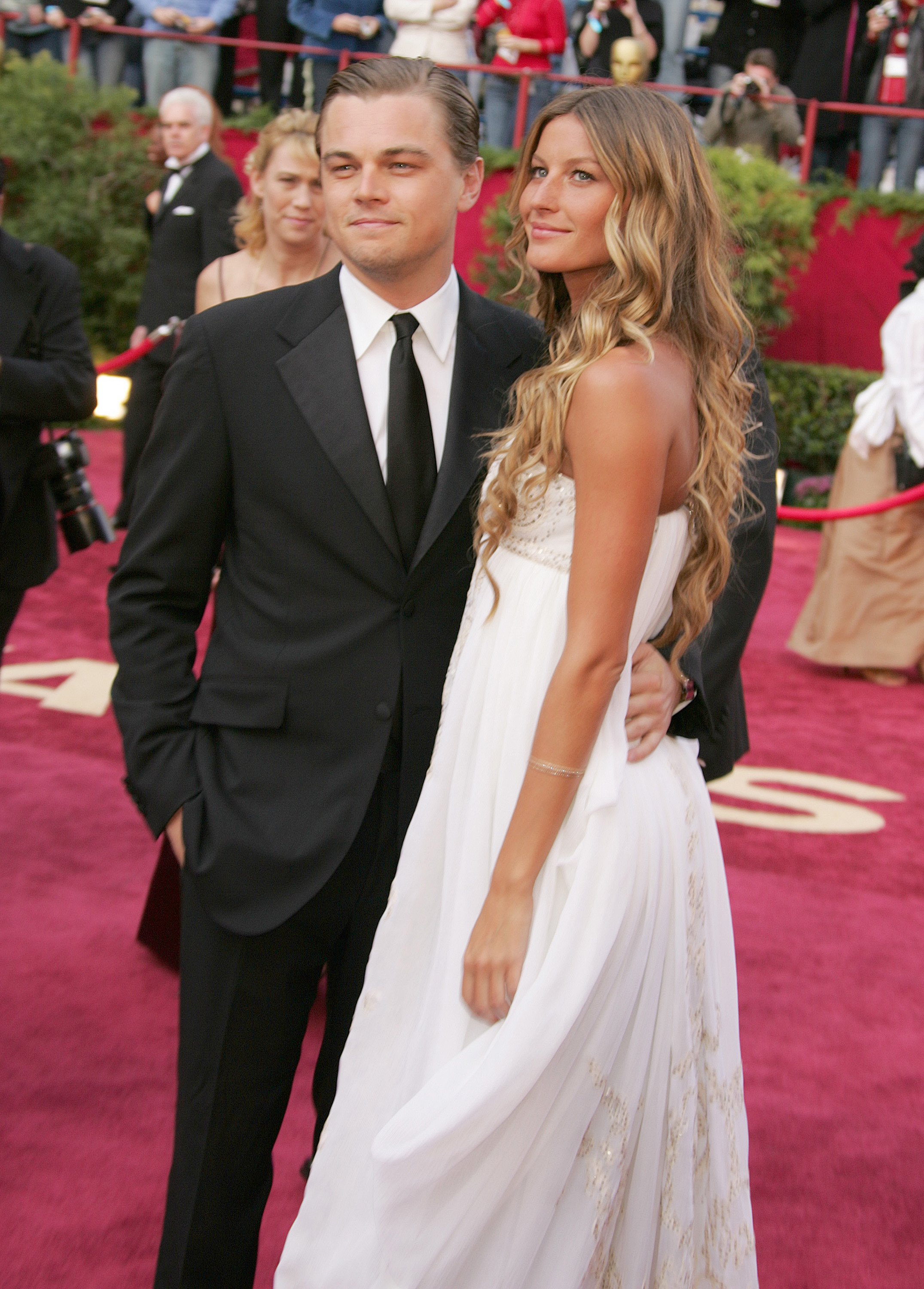 Leonardo DiCaprio and Gisele Bundchen attend the 77th Annual Academy Awards