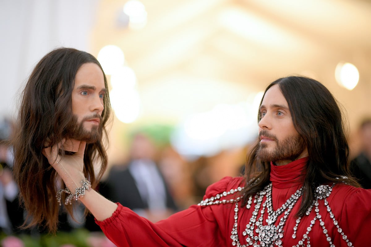 Jared Leto holds a replica of his own head as he arrives at the 2019 Met Gala Celebrating Camp: Notes on Fashion at the Metropolitan Museum of Art on May 6, 2019, in New York City.