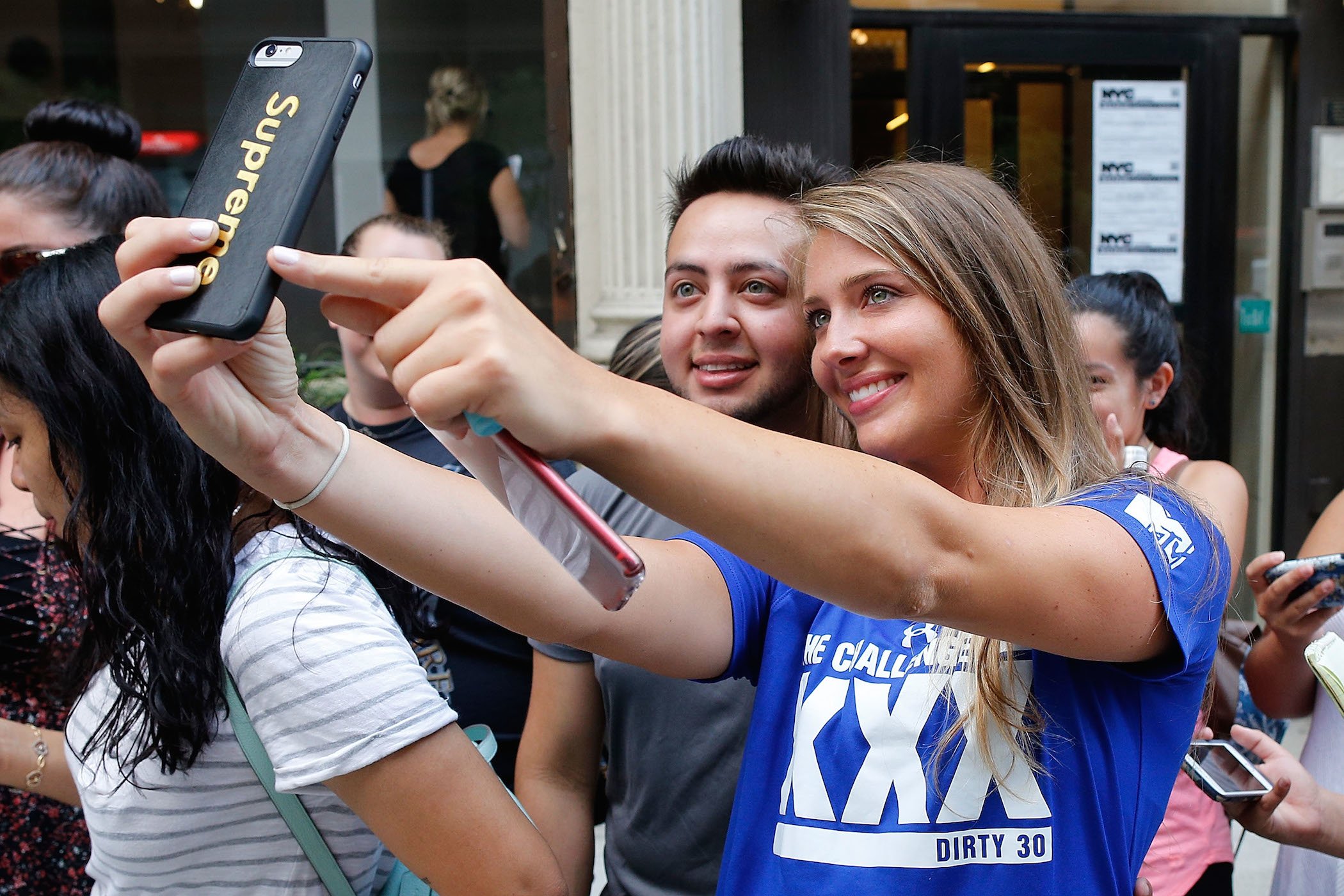 Jenna Compono from MTV's 'The Challenge' taking a selfie with a fan