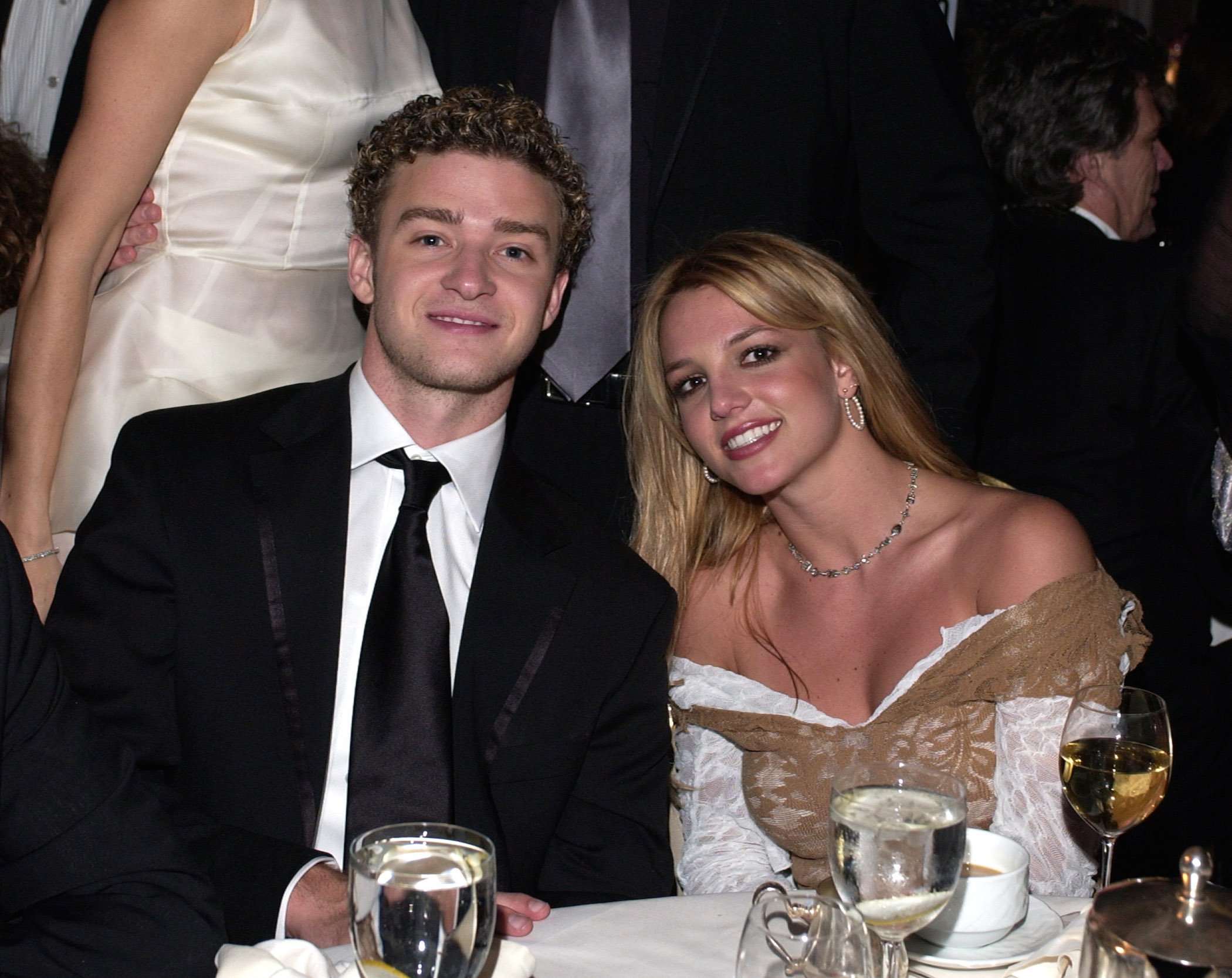 Justin Timberlake and Britney Spears sitting together and smiling