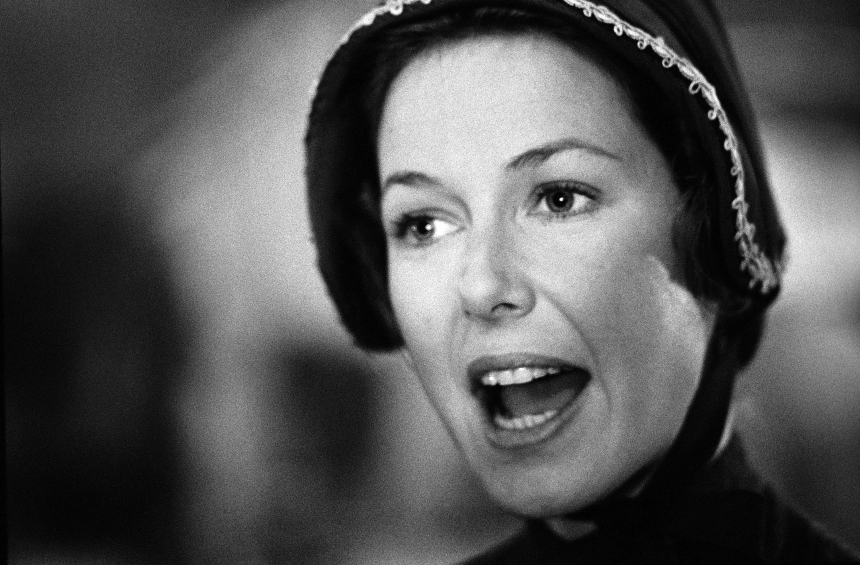 A black and white photo of Karen Grassle as Ma Ingalls on 'Little House on the Prairie'
