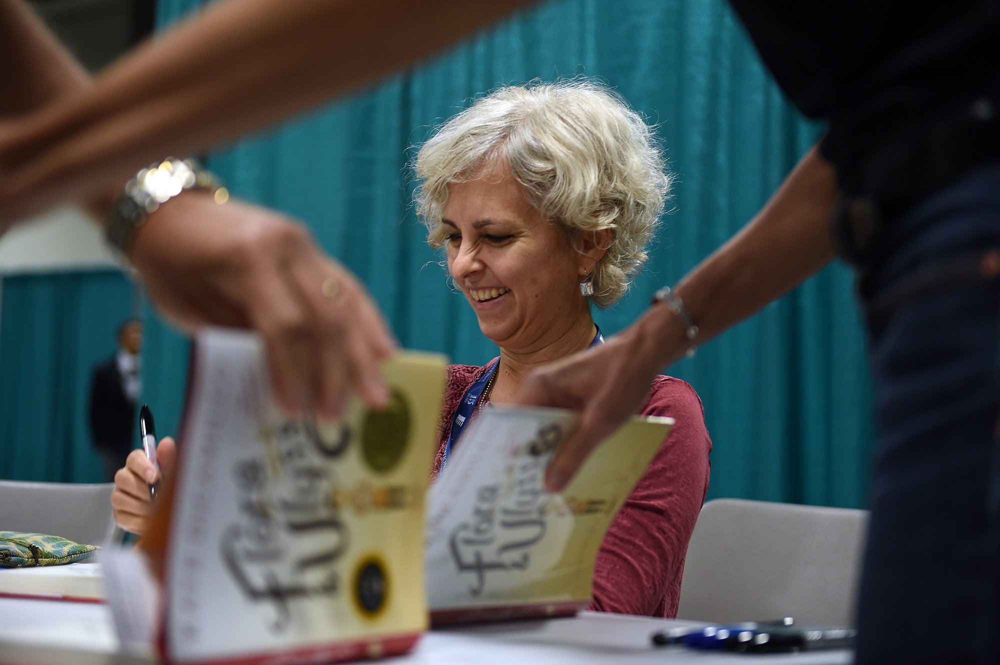 Kate DiCamillo signing books