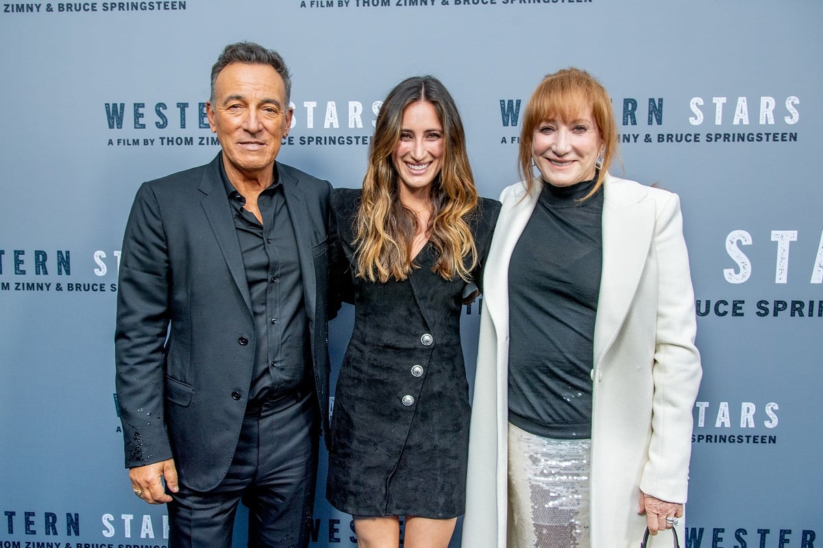 (L to R): Bruce Springsteen,  Jessica Rae Springsteen, and Patti Scialf smiling  at Western Stars screening