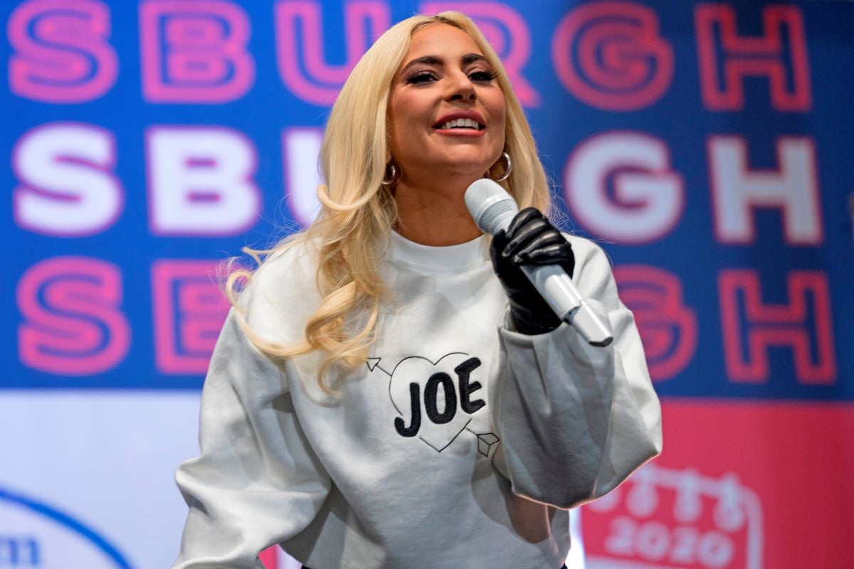 Lady Gaga sings wearing a Joe Biden sweater during a Drive-In Rally at Heinz Field in Pittsburgh, Pennsylvania