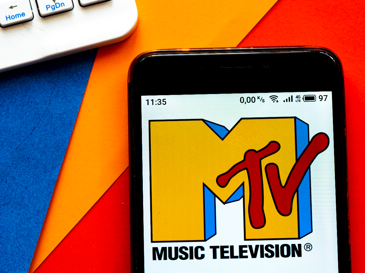 In this photo illustration a MTV (originally an initialism of Music Television) logo seen displayed on a smartphone