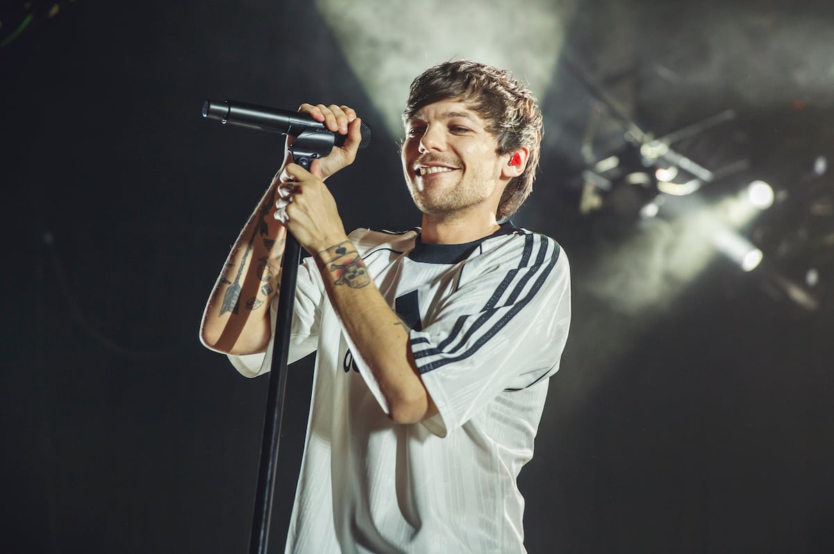 Why are fans 'proud' of Louis Tomlinson