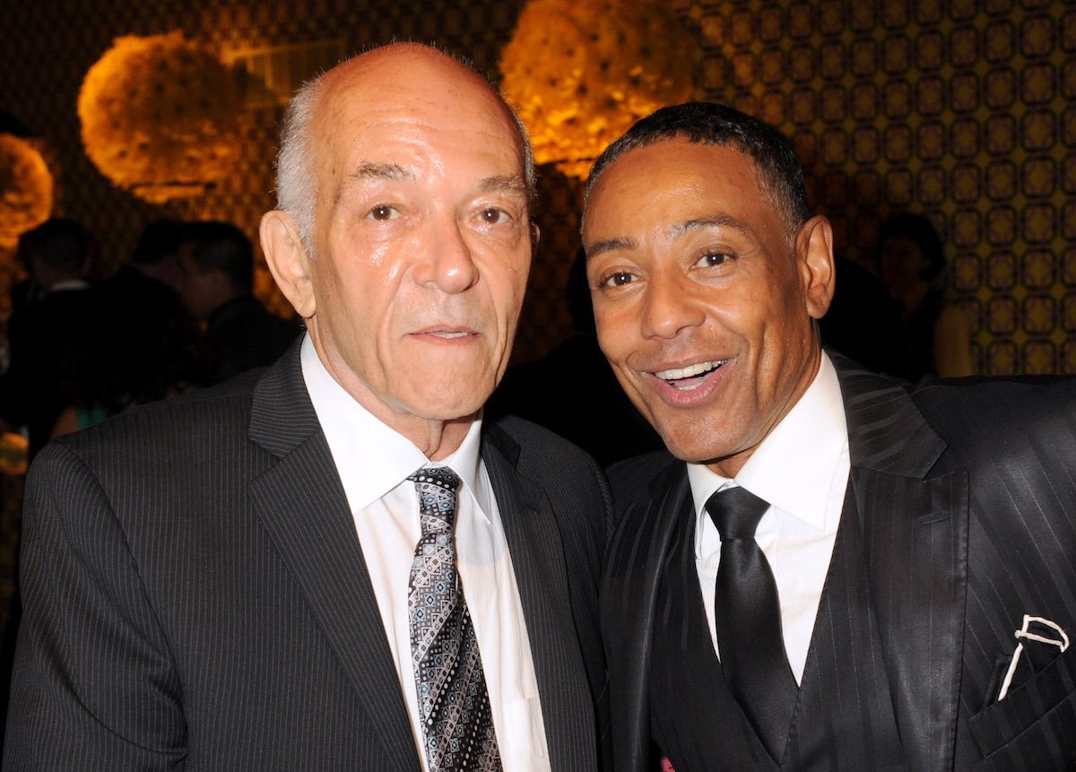 Mark Margolis and Giancarlo Esposito look at the camera dressed in suits
