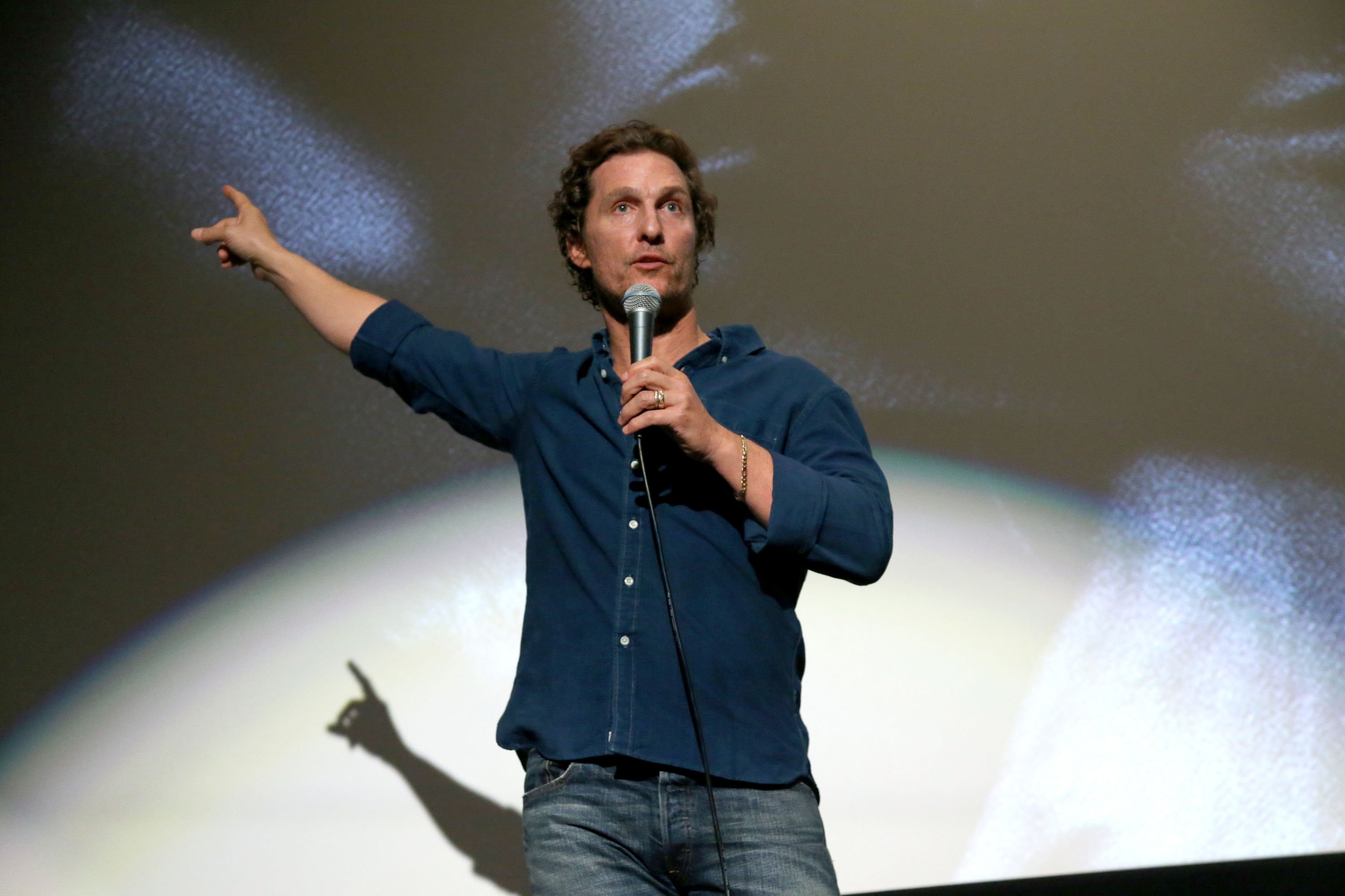 Matthew McConaughey pointing at a screening of White Boy Rick