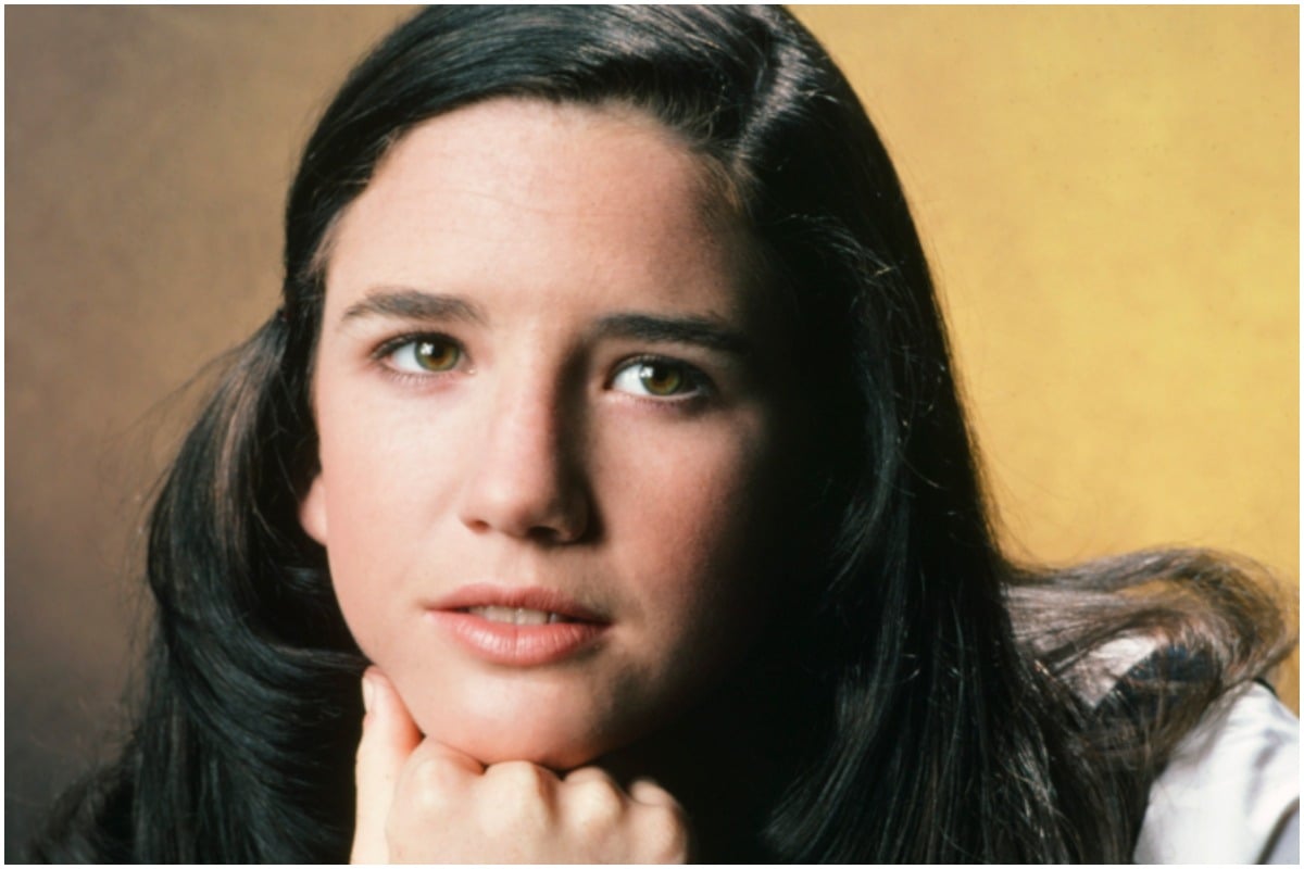 Melissa Gilbert staring at the camera with brown hair.