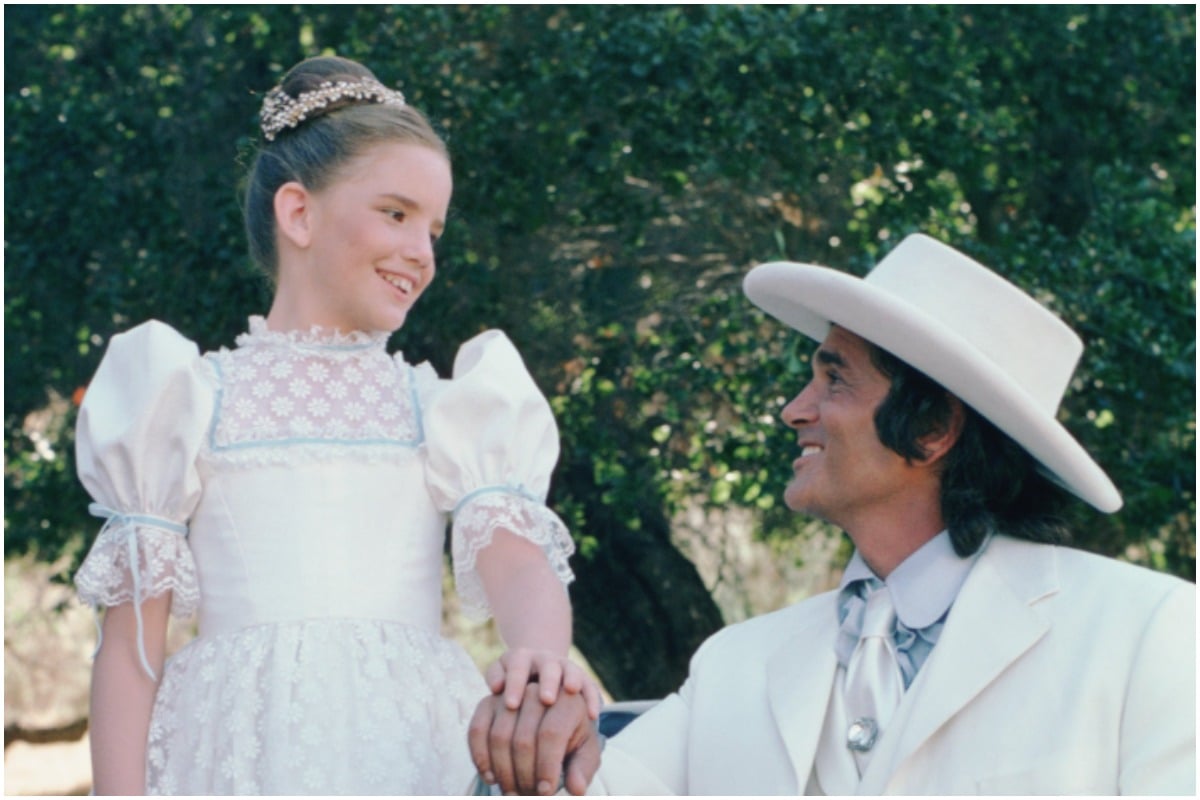 'Little House on the Prairie': Melissa Gillbert in a white dress, Michael Landon in a white hat and white suit.