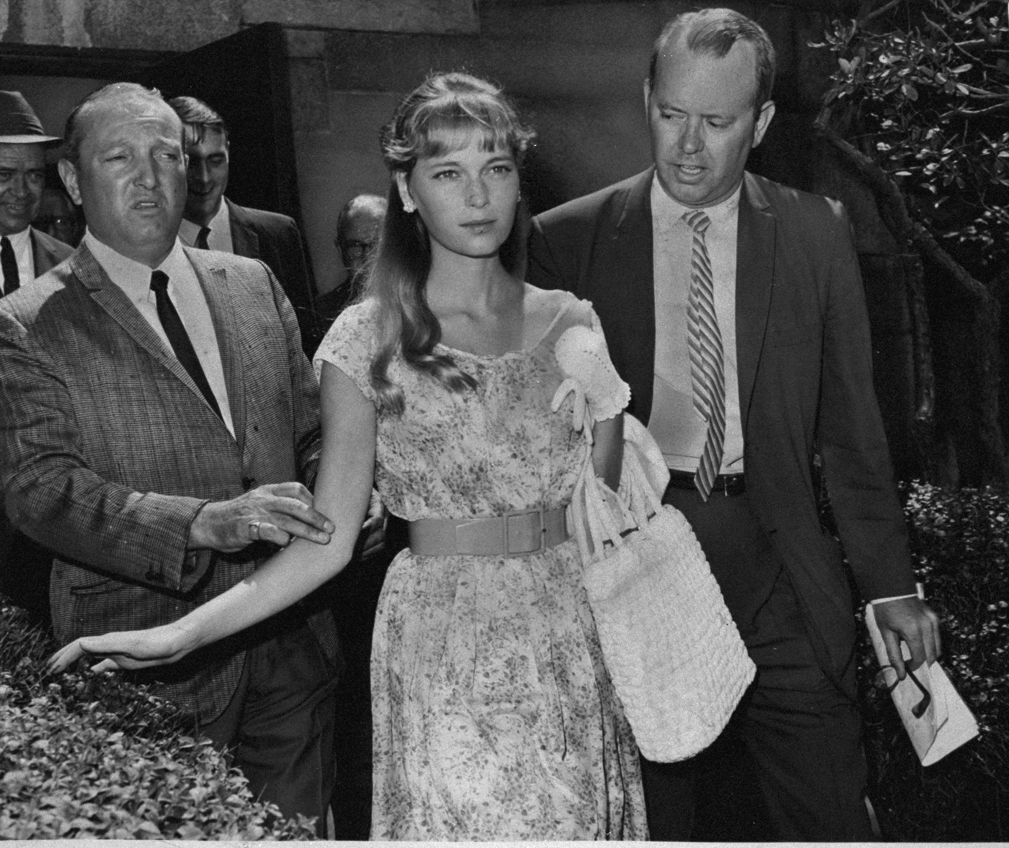 Mia Farrow as a teenager walking