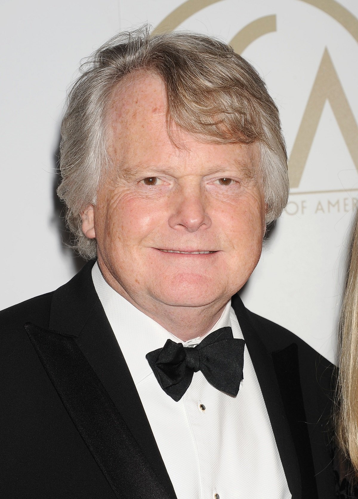 Closeup of Lord Michael Dobbs on the red carpet in 2014